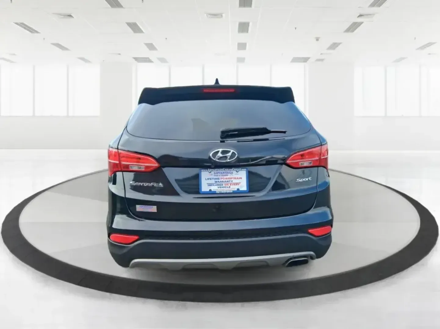 2015 Hyundai Santa Fe Sport 2.4 FWD (5XYZU3LB1FG) with an 2.4L L4 DOHC 16V engine, 6-Speed Automatic transmission, located at 1099 N County Rd 25A , Troy, OH, 45373, (937) 908-9800, 40.057079, -84.212883 - Picture your next road trip out of Troy: the kids buckled in, luggage packed, and plenty of comfort for I75 runs to Dayton or weekend getaways near the Miami River-without feeling like you're stretching your budget. This 2015 Hyundai Santa Fe 2.4L in Twilight Black is the kind of practical, do-it-al- Photo#3