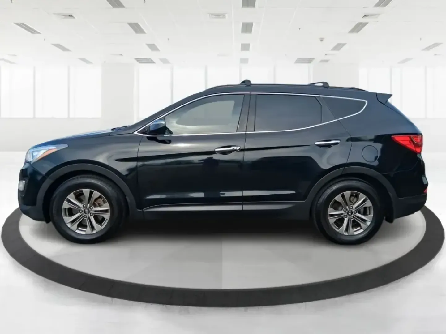 2015 Hyundai Santa Fe Sport 2.4 FWD (5XYZU3LB1FG) with an 2.4L L4 DOHC 16V engine, 6-Speed Automatic transmission, located at 1099 N County Rd 25A , Troy, OH, 45373, (937) 908-9800, 40.057079, -84.212883 - Picture your next road trip out of Troy: the kids buckled in, luggage packed, and plenty of comfort for I75 runs to Dayton or weekend getaways near the Miami River-without feeling like you're stretching your budget. This 2015 Hyundai Santa Fe 2.4L in Twilight Black is the kind of practical, do-it-al- Photo#5