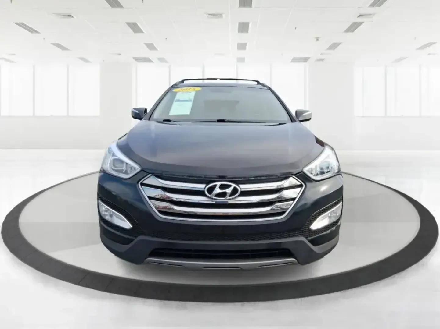 2015 Hyundai Santa Fe Sport 2.4 FWD (5XYZU3LB1FG) with an 2.4L L4 DOHC 16V engine, 6-Speed Automatic transmission, located at 1099 N County Rd 25A , Troy, OH, 45373, (937) 908-9800, 40.057079, -84.212883 - Picture your next road trip out of Troy: the kids buckled in, luggage packed, and plenty of comfort for I75 runs to Dayton or weekend getaways near the Miami River-without feeling like you're stretching your budget. This 2015 Hyundai Santa Fe 2.4L in Twilight Black is the kind of practical, do-it-al- Photo#7