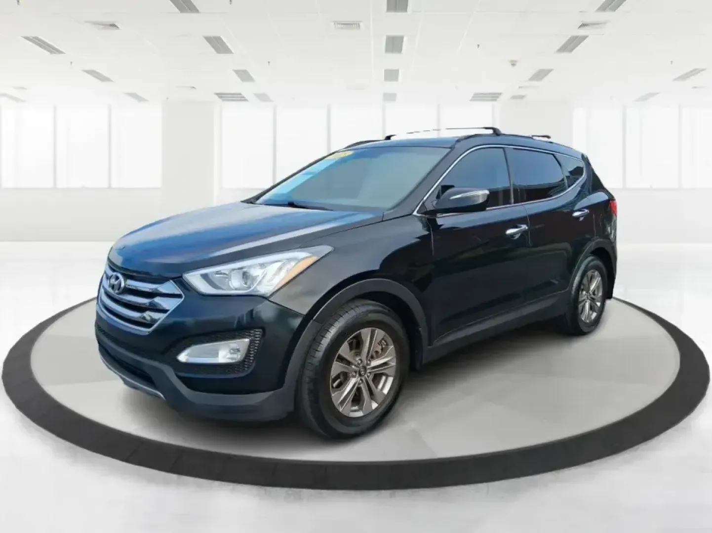 2015 Hyundai Santa Fe Sport 2.4 FWD (5XYZU3LB1FG) with an 2.4L L4 DOHC 16V engine, 6-Speed Automatic transmission, located at 1099 N County Rd 25A , Troy, OH, 45373, (937) 908-9800, 40.057079, -84.212883 - Picture your next road trip out of Troy: the kids buckled in, luggage packed, and plenty of comfort for I75 runs to Dayton or weekend getaways near the Miami River-without feeling like you're stretching your budget. This 2015 Hyundai Santa Fe 2.4L in Twilight Black is the kind of practical, do-it-al- Photo#8