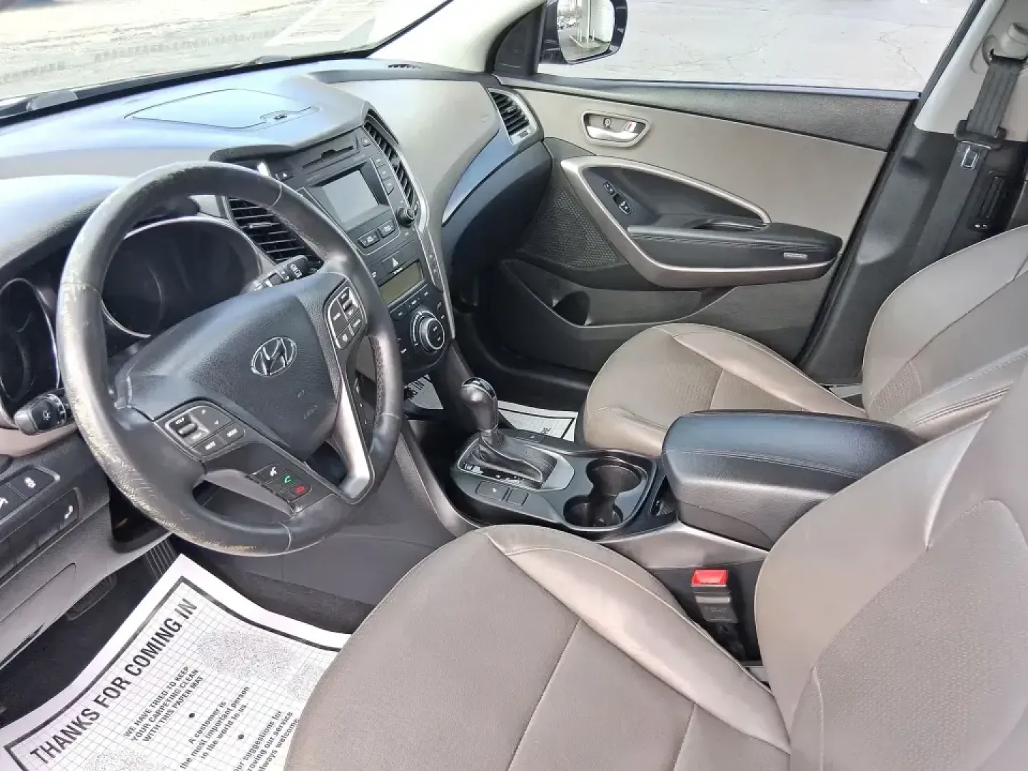2015 Hyundai Santa Fe Sport 2.4 FWD (5XYZU3LB1FG) with an 2.4L L4 DOHC 16V engine, 6-Speed Automatic transmission, located at 1099 N County Rd 25A , Troy, OH, 45373, (937) 908-9800, 40.057079, -84.212883 - Picture your next road trip out of Troy: the kids buckled in, luggage packed, and plenty of comfort for I75 runs to Dayton or weekend getaways near the Miami River-without feeling like you're stretching your budget. This 2015 Hyundai Santa Fe 2.4L in Twilight Black is the kind of practical, do-it-al- Photo#9