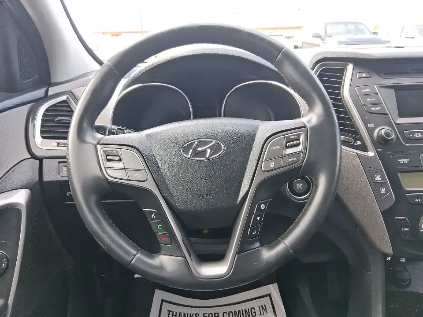 2015 Hyundai Santa Fe Sport 2.4 FWD (5XYZU3LB1FG) with an 2.4L L4 DOHC 16V engine, 6-Speed Automatic transmission, located at 1099 N County Rd 25A , Troy, OH, 45373, (937) 908-9800, 40.057079, -84.212883 - Picture your next road trip out of Troy: the kids buckled in, luggage packed, and plenty of comfort for I75 runs to Dayton or weekend getaways near the Miami River-without feeling like you're stretching your budget. This 2015 Hyundai Santa Fe 2.4L in Twilight Black is the kind of practical, do-it-al- Photo#16
