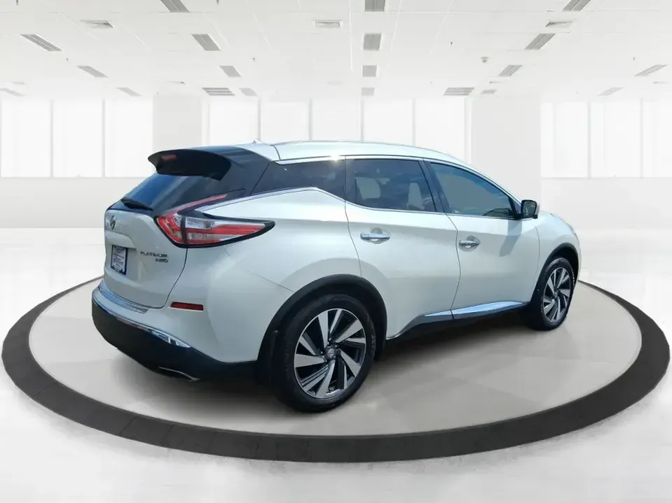 2015 Nissan Murano Platinum (5N1AZ2MH3FN) with an 3.5L V-6 DOHC engine, Continuously Variable Transmission transmission, located at 1951 S Dayton Lakeview Rd., New Carlisle, OH, 45344, (937) 908-9800, 39.890999, -84.050255 - Need one SUV that can handle the weekday commute, keep everyone comfortable on family errands, and still feel upscale for a weekend getaway to John Bryan State Park or a day trip through Dayton? This 2015 Nissan Murano Platinum AWD in Pearl White is built for exactly that kind of real-life driving-s - Photo#2