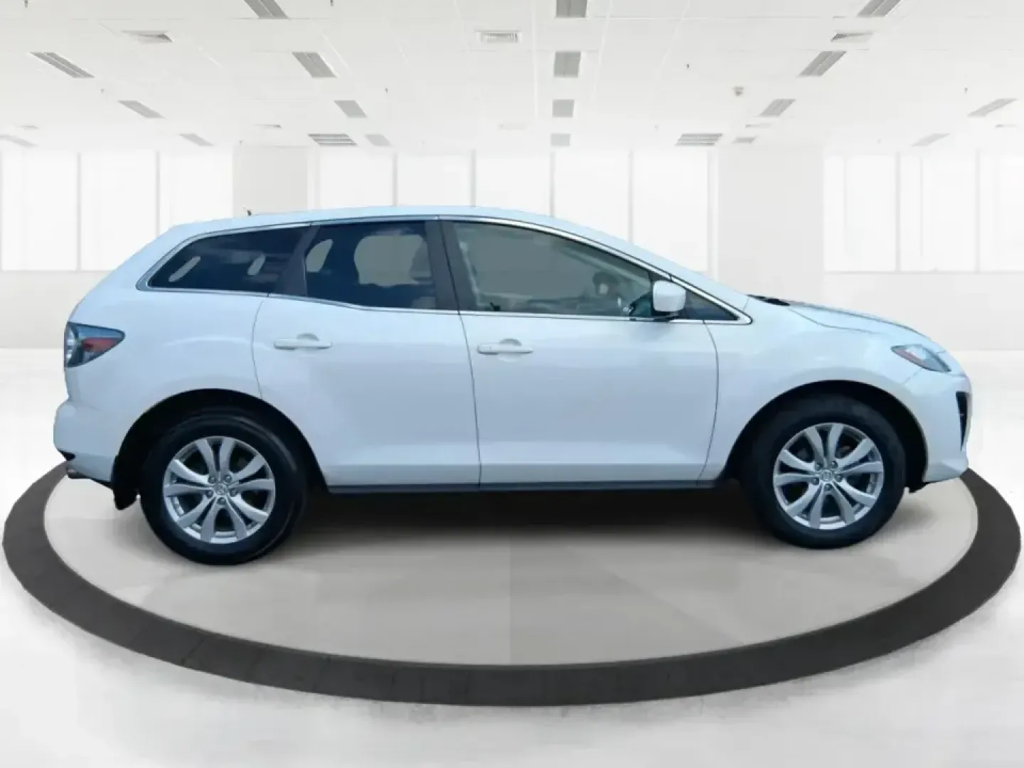 2010 Mazda CX-7 s Touring (JM3ER4W33A0) with an 2.3L I-4 gasoline direct injection engine, 6-Speed Automatic transmission, located at 880 E. National Road, Vandalia, OH, 45377, (937) 908-9800, 39.891918, -84.183594 - Picture your next weekend: loading up the cargo area for a day at Miami County Park, cruising up I75 for a quick getaway, or confidently handling Ohio's surprise rain and winter slush on the school run. This 2010 Mazda CX7 s Touring is the kind of sporty, practical SUV that fits real life in Troy-ea - Photo#1