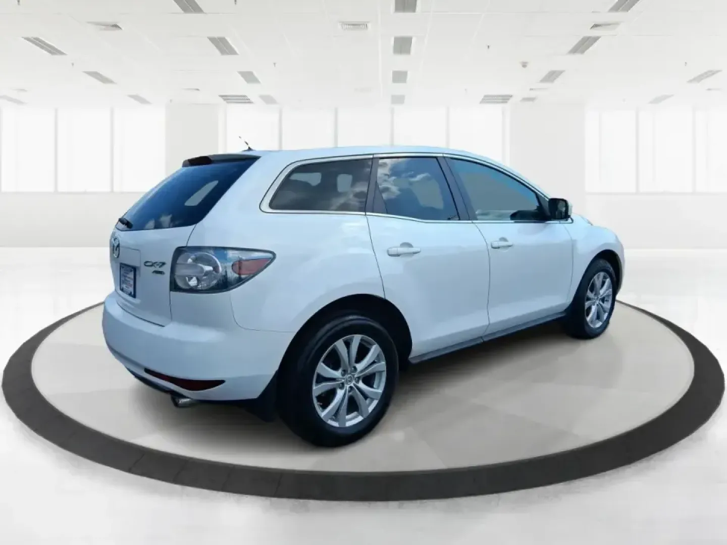 2010 Mazda CX-7 s Touring (JM3ER4W33A0) with an 2.3L I-4 gasoline direct injection engine, 6-Speed Automatic transmission, located at 880 E. National Road, Vandalia, OH, 45377, (937) 908-9800, 39.891918, -84.183594 - Picture your next weekend: loading up the cargo area for a day at Miami County Park, cruising up I75 for a quick getaway, or confidently handling Ohio's surprise rain and winter slush on the school run. This 2010 Mazda CX7 s Touring is the kind of sporty, practical SUV that fits real life in Troy-ea - Photo#2