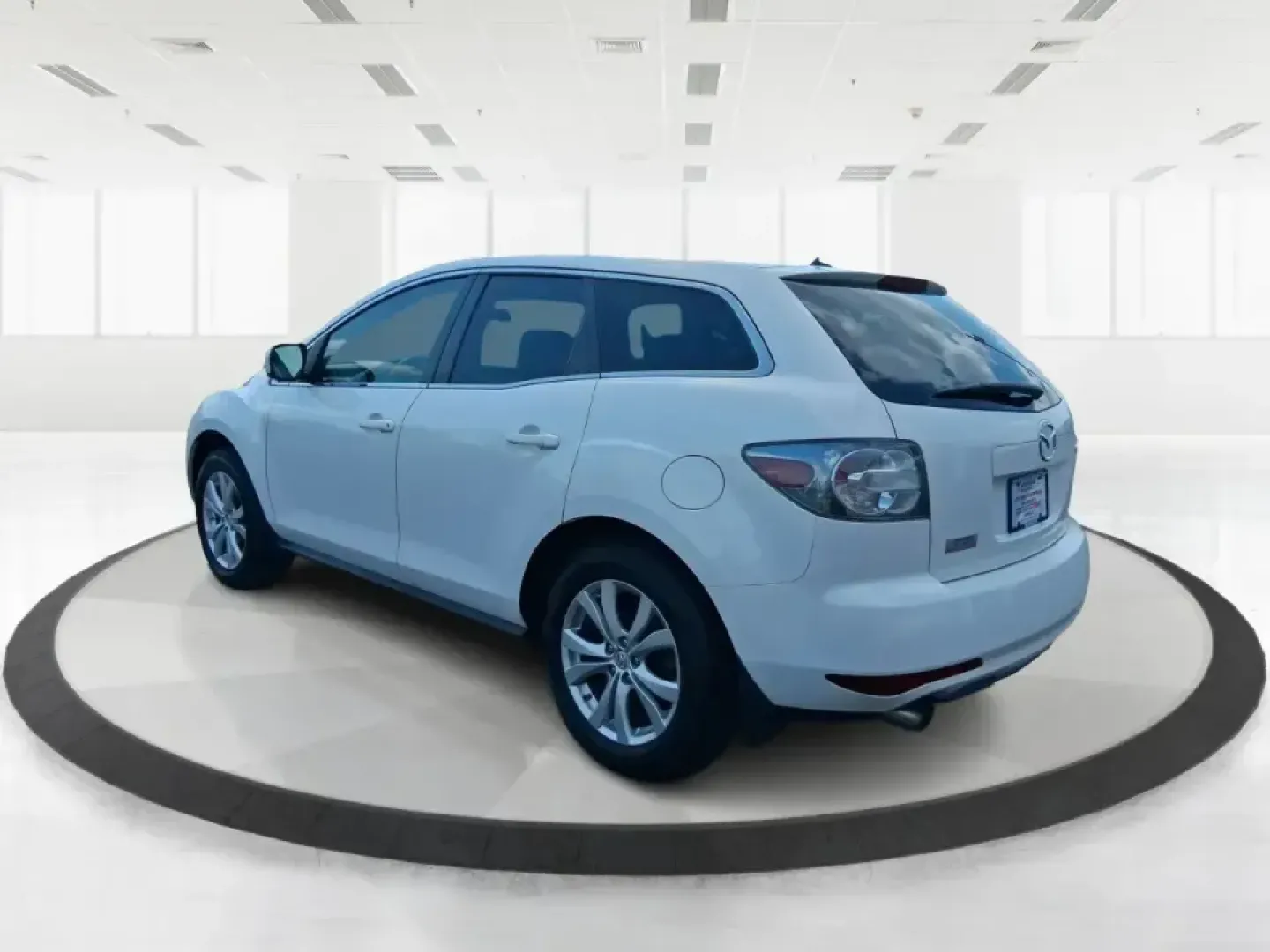 2010 Mazda CX-7 s Touring (JM3ER4W33A0) with an 2.3L I-4 gasoline direct injection engine, 6-Speed Automatic transmission, located at 880 E. National Road, Vandalia, OH, 45377, (937) 908-9800, 39.891918, -84.183594 - Picture your next weekend: loading up the cargo area for a day at Miami County Park, cruising up I75 for a quick getaway, or confidently handling Ohio's surprise rain and winter slush on the school run. This 2010 Mazda CX7 s Touring is the kind of sporty, practical SUV that fits real life in Troy-ea - Photo#4