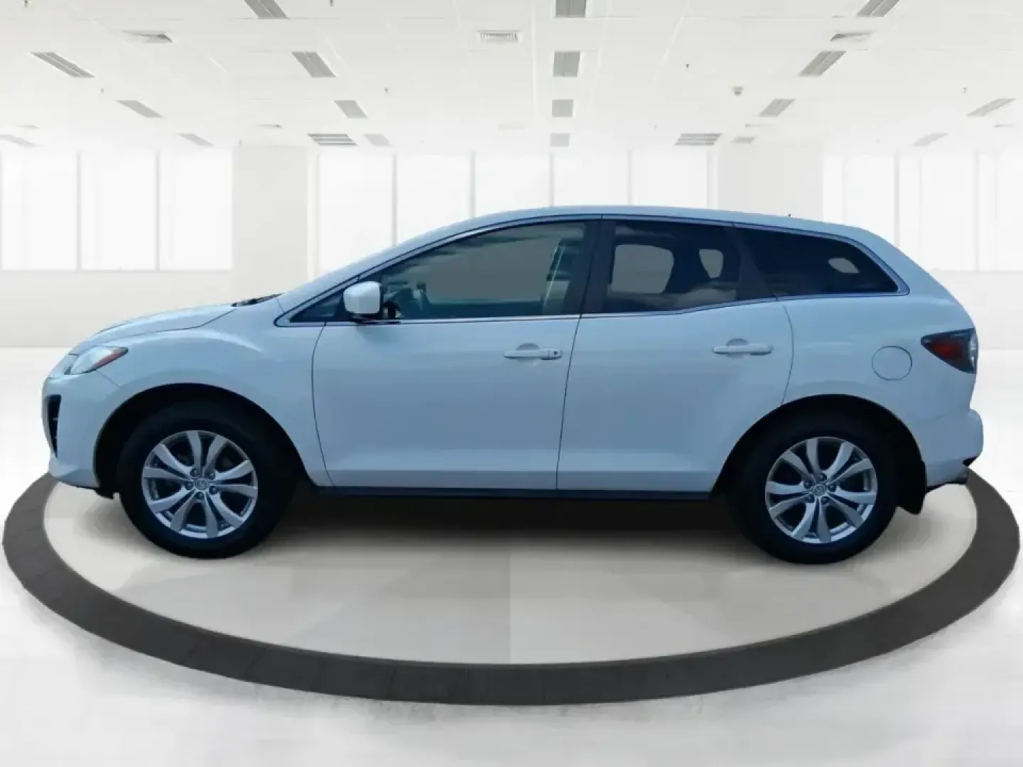 2010 Mazda CX-7 s Touring (JM3ER4W33A0) with an 2.3L I-4 gasoline direct injection engine, 6-Speed Automatic transmission, located at 880 E. National Road, Vandalia, OH, 45377, (937) 908-9800, 39.891918, -84.183594 - Picture your next weekend: loading up the cargo area for a day at Miami County Park, cruising up I75 for a quick getaway, or confidently handling Ohio's surprise rain and winter slush on the school run. This 2010 Mazda CX7 s Touring is the kind of sporty, practical SUV that fits real life in Troy-ea - Photo#5