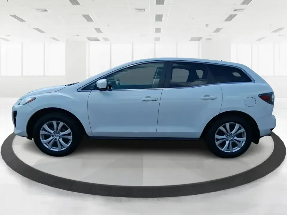 2010 Mazda CX-7 s Touring (JM3ER4W33A0) with an 2.3L I-4 gasoline direct injection engine, 6-Speed Automatic transmission, located at 1230 East Main St, Xenia, OH, 45385, (937) 908-9800, 39.688026, -83.910172 - Picture your next weekend: loading up the cargo area for a day at Miami County Park, cruising up I75 for a quick getaway, or confidently handling Ohio's surprise rain and winter slush on the school run. This 2010 Mazda CX7 s Touring is the kind of sporty, practical SUV that fits real life in Troy-ea - Photo#5