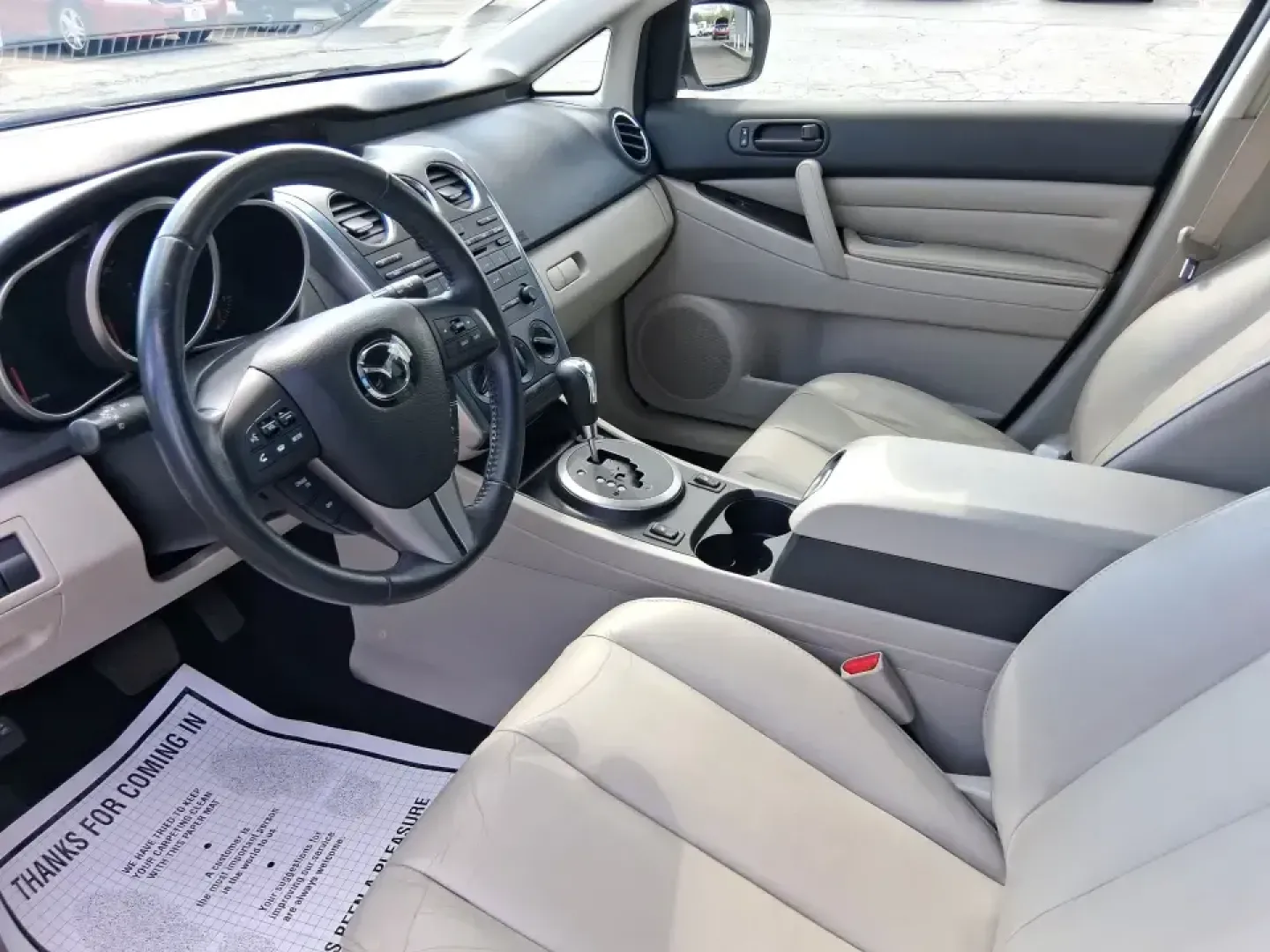 2010 Mazda CX-7 s Touring (JM3ER4W33A0) with an 2.3L I-4 gasoline direct injection engine, 6-Speed Automatic transmission, located at 880 E. National Road, Vandalia, OH, 45377, (937) 908-9800, 39.891918, -84.183594 - Picture your next weekend: loading up the cargo area for a day at Miami County Park, cruising up I75 for a quick getaway, or confidently handling Ohio's surprise rain and winter slush on the school run. This 2010 Mazda CX7 s Touring is the kind of sporty, practical SUV that fits real life in Troy-ea - Photo#9