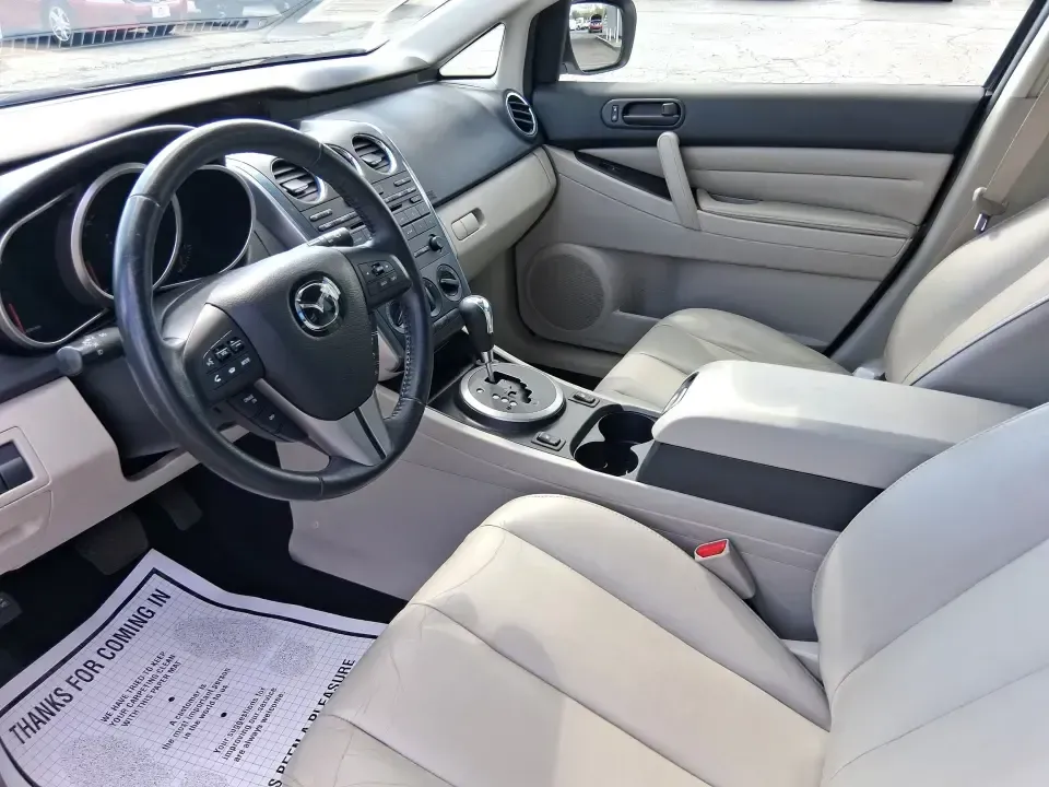 2010 Mazda CX-7 s Touring (JM3ER4W33A0) with an 2.3L I-4 gasoline direct injection engine, 6-Speed Automatic transmission, located at 1230 East Main St, Xenia, OH, 45385, (937) 908-9800, 39.688026, -83.910172 - Picture your next weekend: loading up the cargo area for a day at Miami County Park, cruising up I75 for a quick getaway, or confidently handling Ohio's surprise rain and winter slush on the school run. This 2010 Mazda CX7 s Touring is the kind of sporty, practical SUV that fits real life in Troy-ea - Photo#9