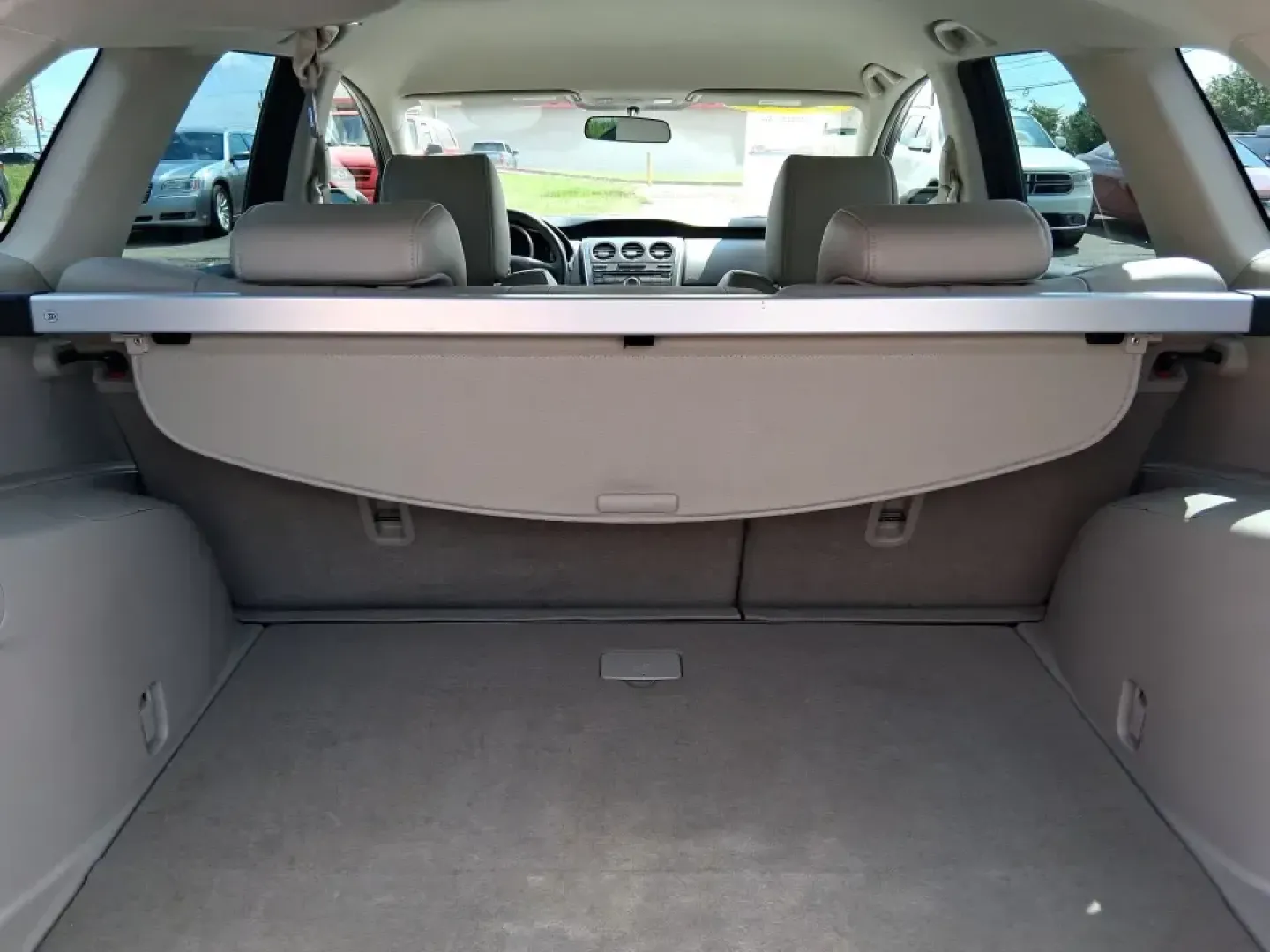 2010 Mazda CX-7 s Touring (JM3ER4W33A0) with an 2.3L I-4 gasoline direct injection engine, 6-Speed Automatic transmission, located at 880 E. National Road, Vandalia, OH, 45377, (937) 908-9800, 39.891918, -84.183594 - Picture your next weekend: loading up the cargo area for a day at Miami County Park, cruising up I75 for a quick getaway, or confidently handling Ohio's surprise rain and winter slush on the school run. This 2010 Mazda CX7 s Touring is the kind of sporty, practical SUV that fits real life in Troy-ea - Photo#12