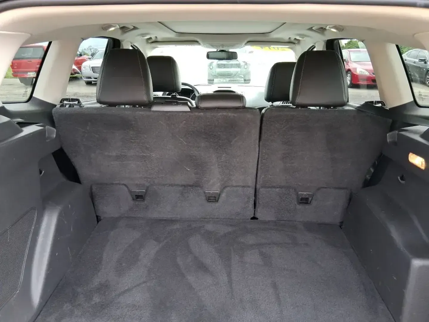 2014 Ford Escape Titanium (1FMCU9J99EU) with an 2.0L L4 DOHC 16V engine, 6-Speed Automatic transmission, located at 1099 N County Rd 25A , Troy, OH, 45373, (937) 908-9800, 40.057079, -84.212883 - Need one SUV that can handle an Ohio winter commute, school drop-offs, and a spontaneous weekend road trip to Hocking Hills without feeling like a compromise? This 2014 Ford Escape Titanium 4WD in sleek Tuxedo Black is built for real life in Troy-comfortable for long drives, confident in bad weather - Photo#12