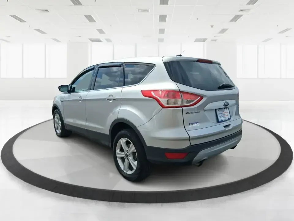 2015 Ford Escape SE (1FMCU9G91FU) with an 2.0L L4 DOHC 16V engine, 6-Speed Automatic transmission, located at 880 E. National Road, Vandalia, OH, 45377, (937) 908-9800, 39.891918, -84.183594 - Weekend getaways to Englewood MetroPark, snowy commutes down I75, and everyday school-and-grocery runs all feel easier when you've got an SUV that's sized right, confident in bad weather, and comfortable for the long haul. This **2015 Ford Escape SE 4WD** in **Ingot Silver** is a smart pick for driv - Photo#4