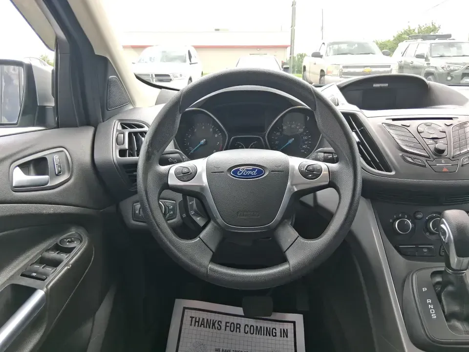 2015 Ford Escape SE (1FMCU9G91FU) with an 2.0L L4 DOHC 16V engine, 6-Speed Automatic transmission, located at 880 E. National Road, Vandalia, OH, 45377, (937) 908-9800, 39.891918, -84.183594 - Weekend getaways to Englewood MetroPark, snowy commutes down I75, and everyday school-and-grocery runs all feel easier when you've got an SUV that's sized right, confident in bad weather, and comfortable for the long haul. This **2015 Ford Escape SE 4WD** in **Ingot Silver** is a smart pick for driv - Photo#16