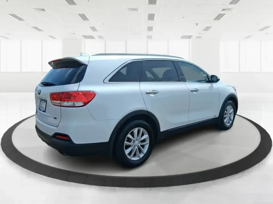 2016 Kia Sorento 2.4L LX (5XYPGDA34GG) with an 2.4L I-4 gasoline direct injection engine, 6-Speed Automatic transmission, located at 880 E. National Road, Vandalia, OH, 45377, (937) 908-9800, 39.891918, -84.183594 - Ready for school drop-offs, I-75 commutes, and spontaneous weekend getaways to the Dayton area-this 2016 Kia Sorento LX is the kind of SUV that fits real life. With confident AWD capability, flexible seating, and everyday comfort, it's a smart pick for growing families, shift workers with long drive - Photo#2