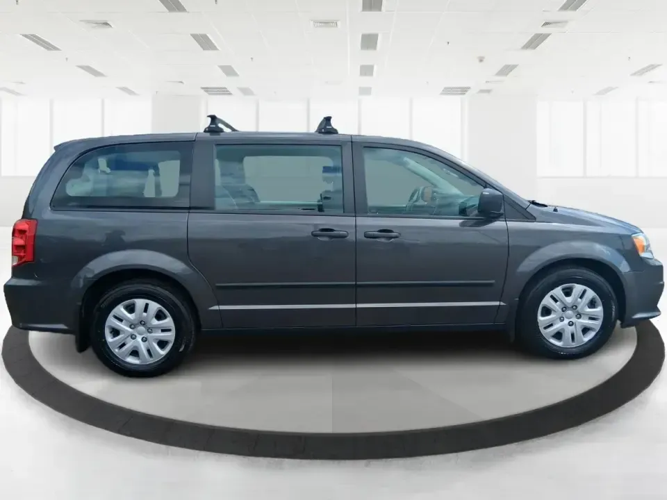 2015 Dodge Grand Caravan American Value Pkg (2C4RDGBG3FR) with an 3.6L V-6 DOHC engine, 6-Speed Automatic transmission, located at 4508 South Dixie Dr, Moraine, OH, 45439, (937) 908-9800, 39.689976, -84.218452 - Road trips to Caesar Creek, school drop-offs through Kettering, and everyday errands up and down South Dixie Drive feel a lot easier when you've got a spacious minivan that's built for real life. This **2015 Dodge Grand Caravan American Value Pkg** is a practical, family-focused van that fits busy s - Photo#1
