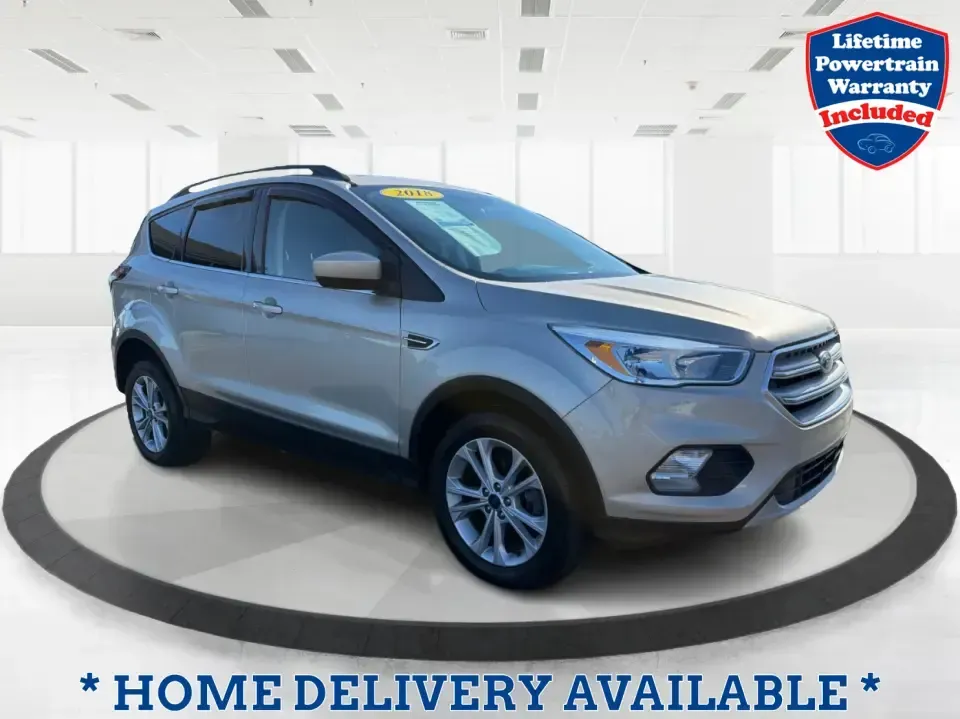 2018 Ford Escape SE FWD (1FMCU0GD6JU) with an 1.5L L4 DOHC 16V engine, 6A transmission, located at 1099 N County Rd 25A , Troy, OH, 45373, (937) 908-9800, 40.057079, -84.212883 - Weekday commute down I75, school drop-offs, and spontaneous weekend getaways to Charleston Falls Preserve all get easier in a compact SUV that fits real life. This 2018 Ford Escape SE FWD is a smart pick for Troy, Ohio drivers who want SUV versatility without the bulk-easy to park near downtown Troy- Photo#0