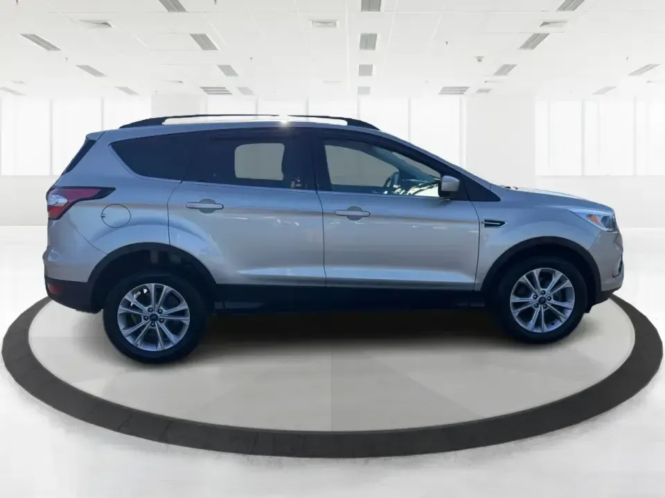 2018 Ford Escape SE FWD (1FMCU0GD6JU) with an 1.5L L4 DOHC 16V engine, 6A transmission, located at 1099 N County Rd 25A , Troy, OH, 45373, (937) 908-9800, 40.057079, -84.212883 - Weekday commute down I75, school drop-offs, and spontaneous weekend getaways to Charleston Falls Preserve all get easier in a compact SUV that fits real life. This 2018 Ford Escape SE FWD is a smart pick for Troy, Ohio drivers who want SUV versatility without the bulk-easy to park near downtown Troy- Photo#1
