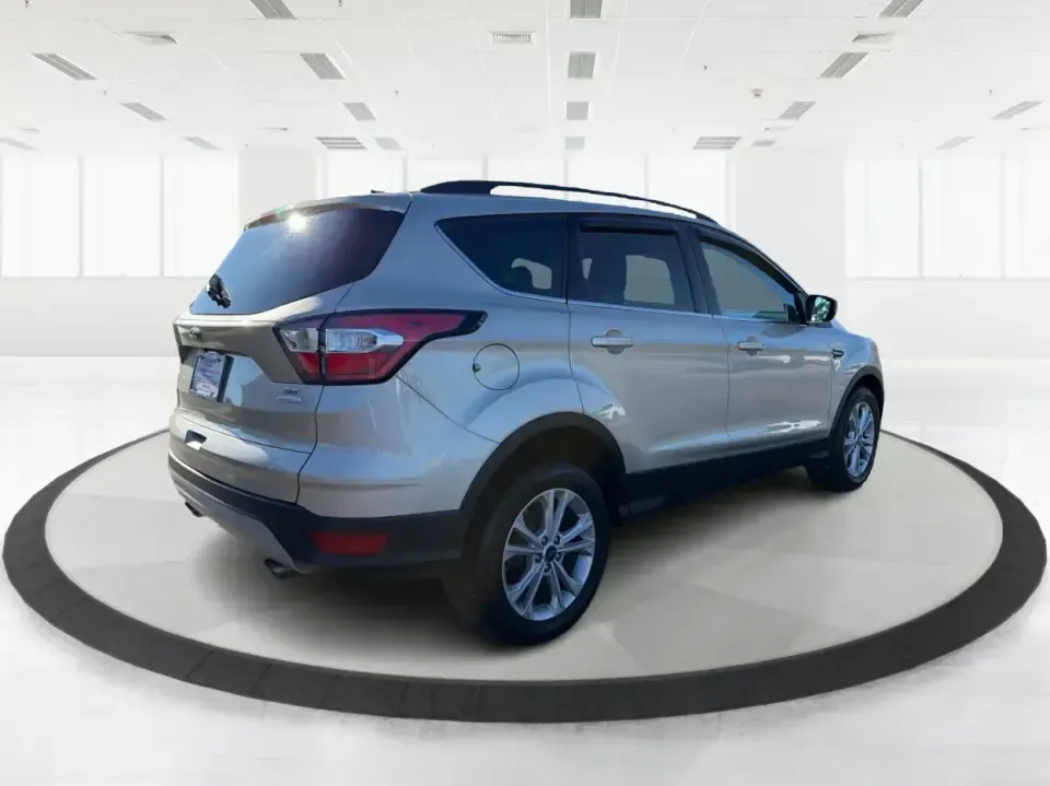 2018 Ford Escape SE FWD (1FMCU0GD6JU) with an 1.5L L4 DOHC 16V engine, 6A transmission, located at 1099 N County Rd 25A , Troy, OH, 45373, (937) 908-9800, 40.057079, -84.212883 - Weekday commute down I75, school drop-offs, and spontaneous weekend getaways to Charleston Falls Preserve all get easier in a compact SUV that fits real life. This 2018 Ford Escape SE FWD is a smart pick for Troy, Ohio drivers who want SUV versatility without the bulk-easy to park near downtown Troy- Photo#2