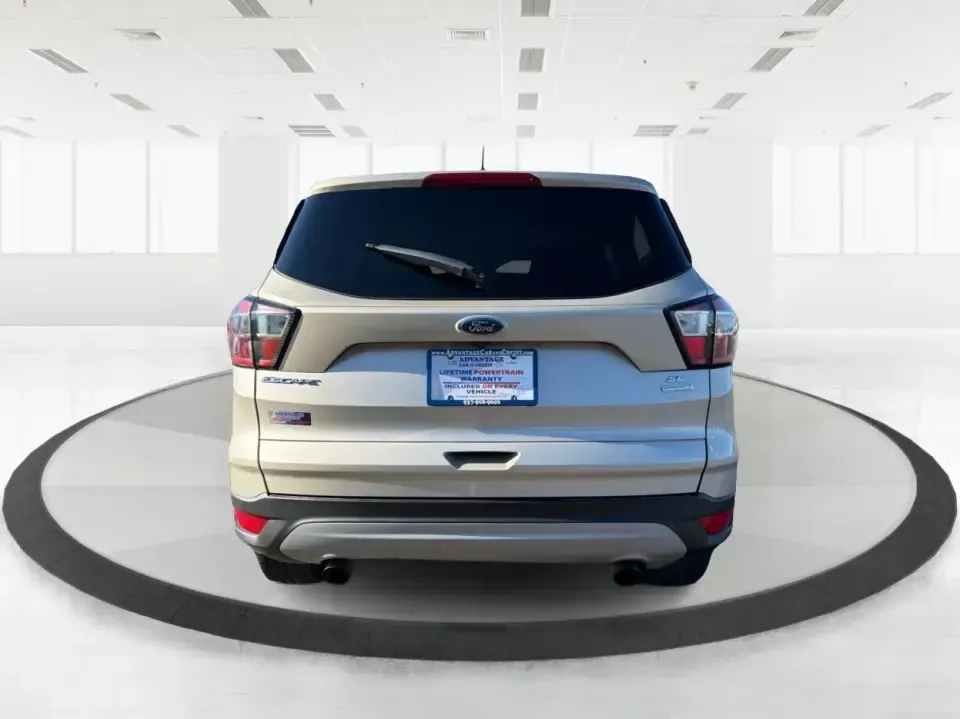 2018 Ford Escape SE FWD (1FMCU0GD6JU) with an 1.5L L4 DOHC 16V engine, 6A transmission, located at 1099 N County Rd 25A , Troy, OH, 45373, (937) 908-9800, 40.057079, -84.212883 - Weekday commute down I75, school drop-offs, and spontaneous weekend getaways to Charleston Falls Preserve all get easier in a compact SUV that fits real life. This 2018 Ford Escape SE FWD is a smart pick for Troy, Ohio drivers who want SUV versatility without the bulk-easy to park near downtown Troy- Photo#3
