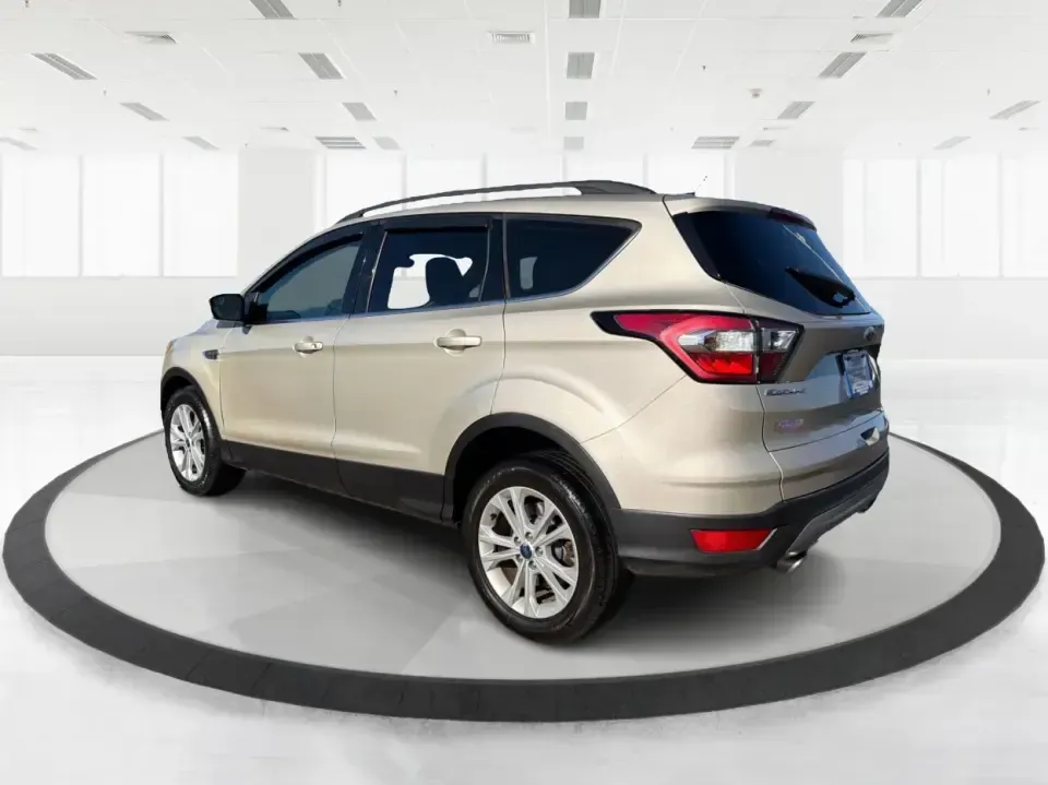 2018 Ford Escape SE FWD (1FMCU0GD6JU) with an 1.5L L4 DOHC 16V engine, 6A transmission, located at 1099 N County Rd 25A , Troy, OH, 45373, (937) 908-9800, 40.057079, -84.212883 - Weekday commute down I75, school drop-offs, and spontaneous weekend getaways to Charleston Falls Preserve all get easier in a compact SUV that fits real life. This 2018 Ford Escape SE FWD is a smart pick for Troy, Ohio drivers who want SUV versatility without the bulk-easy to park near downtown Troy- Photo#4