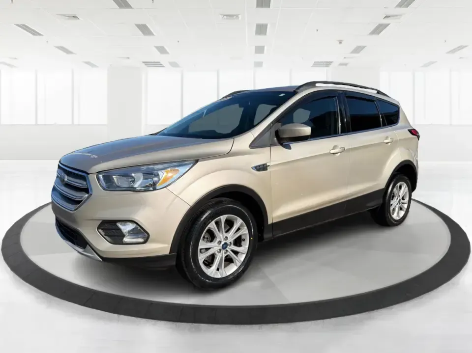 2018 Ford Escape SE FWD (1FMCU0GD6JU) with an 1.5L L4 DOHC 16V engine, 6A transmission, located at 1099 N County Rd 25A , Troy, OH, 45373, (937) 908-9800, 40.057079, -84.212883 - Weekday commute down I75, school drop-offs, and spontaneous weekend getaways to Charleston Falls Preserve all get easier in a compact SUV that fits real life. This 2018 Ford Escape SE FWD is a smart pick for Troy, Ohio drivers who want SUV versatility without the bulk-easy to park near downtown Troy- Photo#8