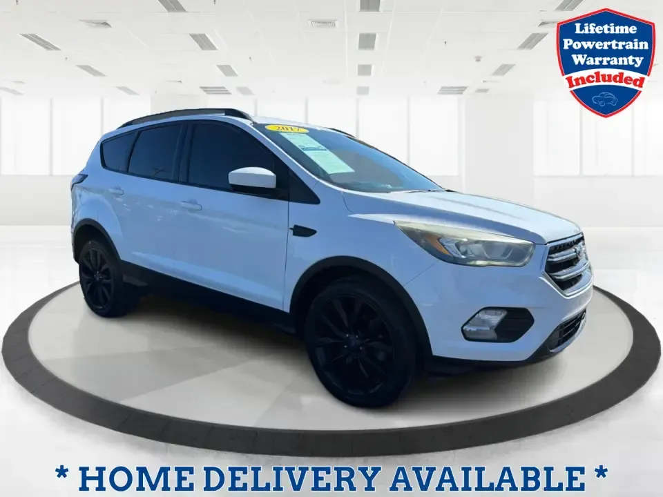 2017 Ford Escape SE (1FMCU0GD2HU) with an 1.5L L4 DOHC 16V engine, 6A transmission, located at 401 Woodman Dr, Riverside, OH, 45431, (937) 908-9800, 39.760899, -84.123421 - Picture a weekday that starts with a smooth commute up N County Rd 25A, turns into easy school drop-offs, and ends with a weekend escape to Indian Lake or a quick run down I75 for shopping and dinner-this 2017 Ford Escape SE is built for real life in and around Piqua, Ohio. Finished in standout Whit - Photo#0