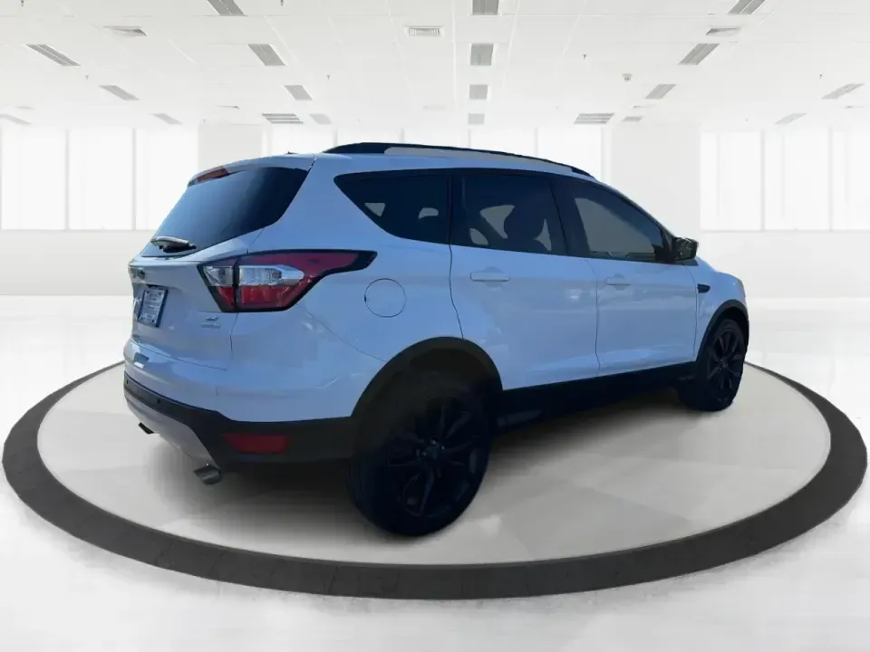 2017 Ford Escape SE (1FMCU0GD2HU) with an 1.5L L4 DOHC 16V engine, 6A transmission, located at 401 Woodman Dr, Riverside, OH, 45431, (937) 908-9800, 39.760899, -84.123421 - Picture a weekday that starts with a smooth commute up N County Rd 25A, turns into easy school drop-offs, and ends with a weekend escape to Indian Lake or a quick run down I75 for shopping and dinner-this 2017 Ford Escape SE is built for real life in and around Piqua, Ohio. Finished in standout Whit - Photo#2