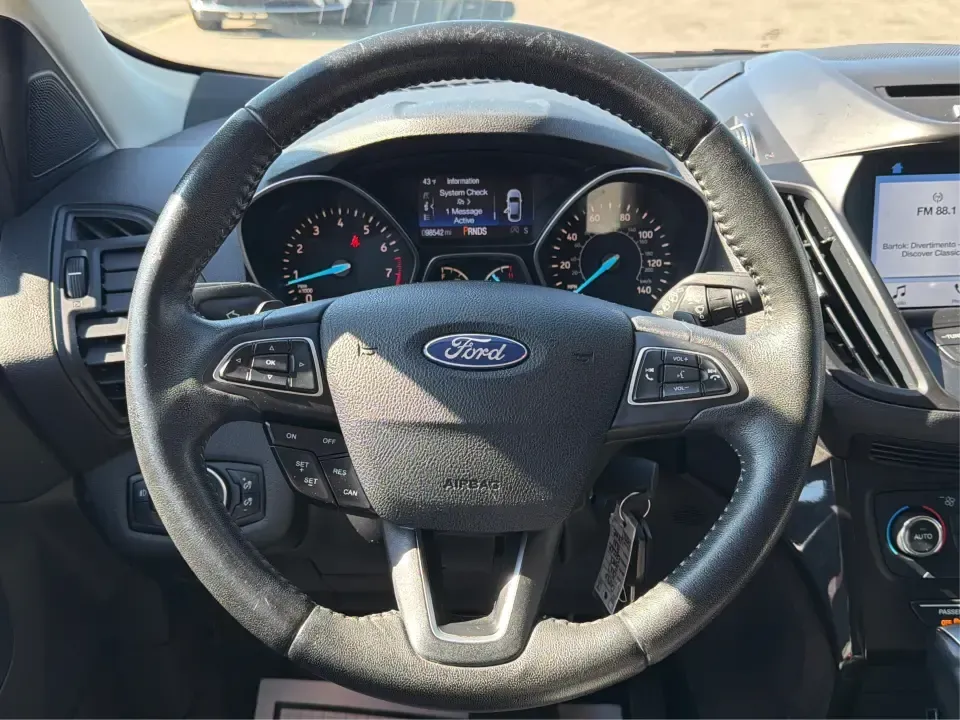 2017 Ford Escape SE (1FMCU0GD2HU) with an 1.5L L4 DOHC 16V engine, 6A transmission, located at 401 Woodman Dr, Riverside, OH, 45431, (937) 908-9800, 39.760899, -84.123421 - Picture a weekday that starts with a smooth commute up N County Rd 25A, turns into easy school drop-offs, and ends with a weekend escape to Indian Lake or a quick run down I75 for shopping and dinner-this 2017 Ford Escape SE is built for real life in and around Piqua, Ohio. Finished in standout Whit - Photo#16