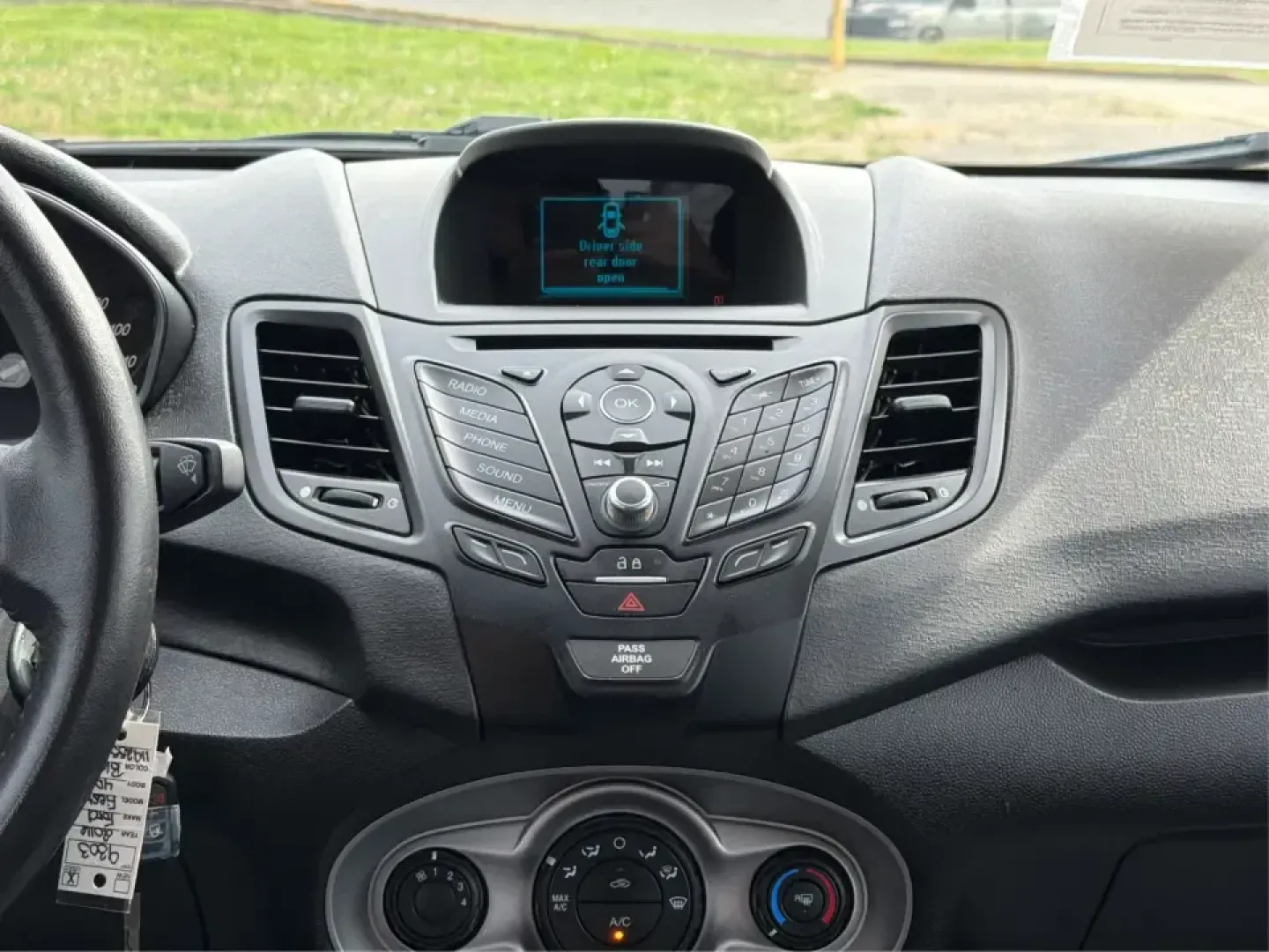 2016 Ford Fiesta SE (3FADP4EJ8GM) with an 1.6L L4 DOHC 16V engine, located at 8750 N County Rd 25A, Piqua, OH, 45356, (937) 908-9800, 40.164391, -84.232513 - Need a smart, easy-to-park hatchback that makes daily life simpler-whether you're commuting up I-75, running errands around downtown Piqua, or packing up for a weekend at Lock 9 Park? This 2016 Ford Fiesta SE Hatchback in Shadow Black delivers big practicality in a small, budget-friendly footprint, - Photo#13