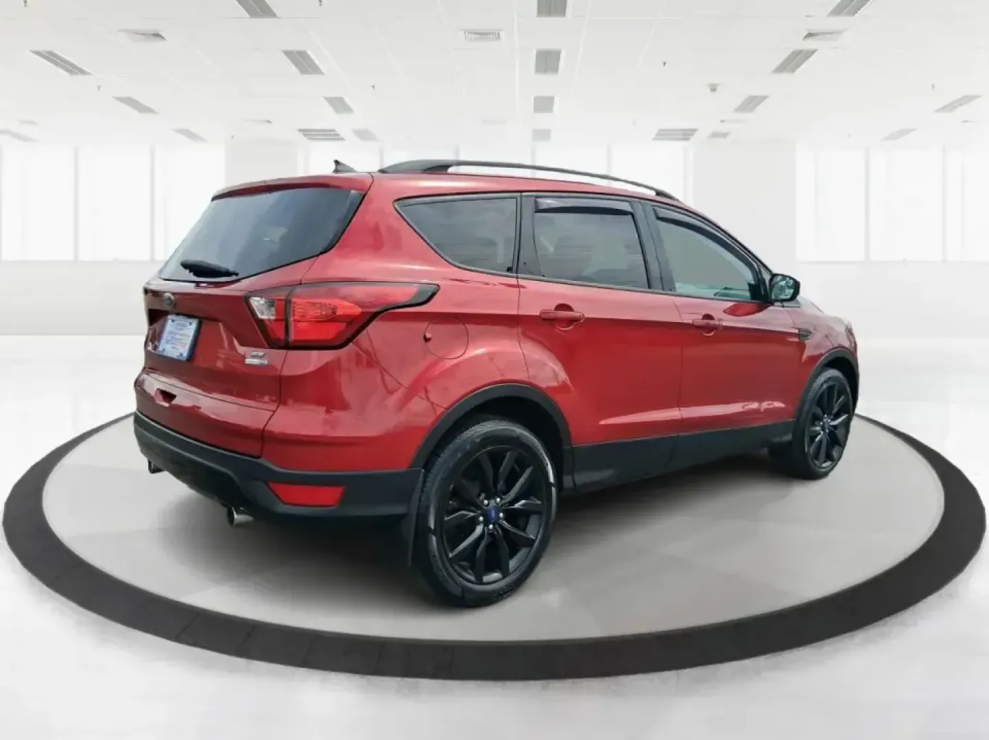 2019 Ford Escape SE 4WD (1FMCU9GD8KU) with an 1.5L L4 DOHC 16V engine, 6A transmission, located at 8750 N County Rd 25A, Piqua, OH, 45356, (937) 908-9800, 40.164391, -84.232513 - Picture a weekend that starts with a quick commute through Miami County and ends with a spontaneous getaway-your SUV packed, playlists ready, and the confidence to handle Ohio's changing weather. This 2019 Ford Escape SE in eye-catching Ruby Red Metallic Tinted Clearcoat is built for real life in Pi- Photo#2