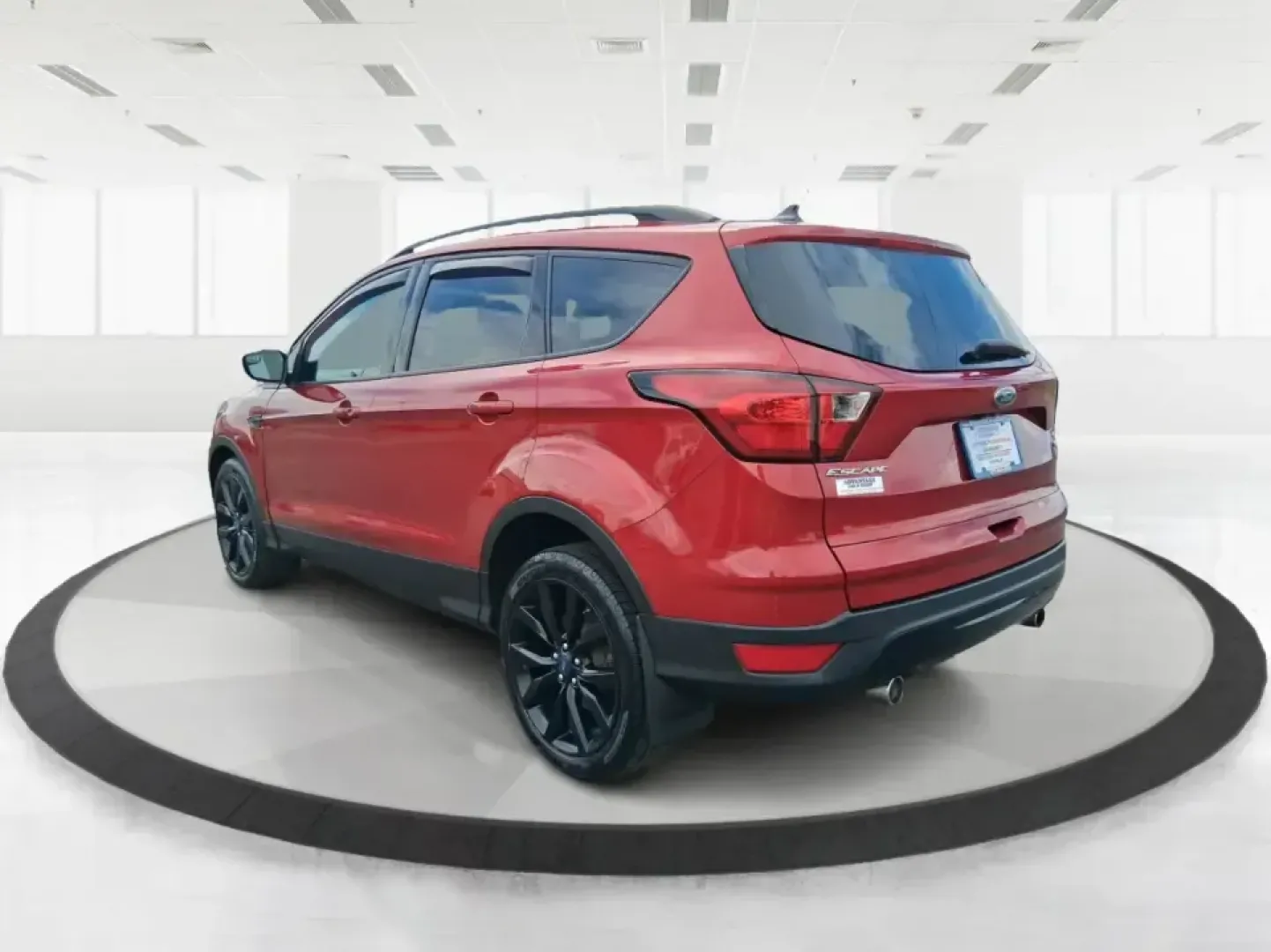2019 Ford Escape SE 4WD (1FMCU9GD8KU) with an 1.5L L4 DOHC 16V engine, 6A transmission, located at 8750 N County Rd 25A, Piqua, OH, 45356, (937) 908-9800, 40.164391, -84.232513 - Picture a weekend that starts with a quick commute through Miami County and ends with a spontaneous getaway-your SUV packed, playlists ready, and the confidence to handle Ohio's changing weather. This 2019 Ford Escape SE in eye-catching Ruby Red Metallic Tinted Clearcoat is built for real life in Pi- Photo#4