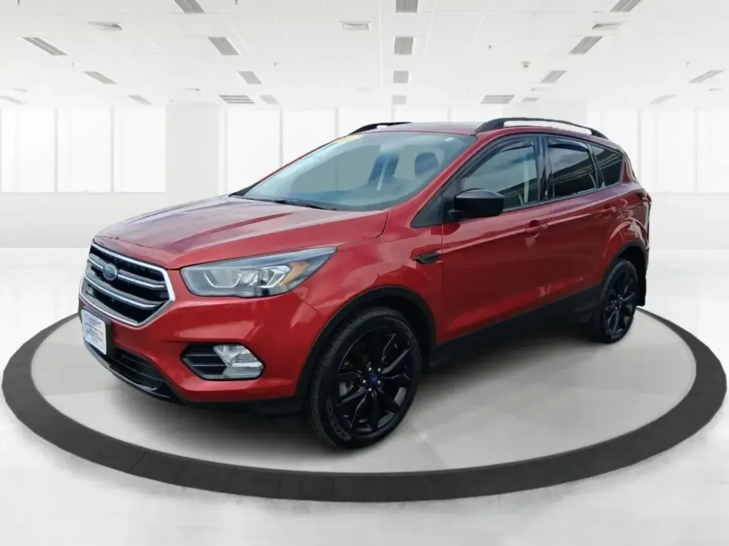 2019 Ford Escape SE 4WD (1FMCU9GD8KU) with an 1.5L L4 DOHC 16V engine, 6A transmission, located at 8750 N County Rd 25A, Piqua, OH, 45356, (937) 908-9800, 40.164391, -84.232513 - Picture a weekend that starts with a quick commute through Miami County and ends with a spontaneous getaway-your SUV packed, playlists ready, and the confidence to handle Ohio's changing weather. This 2019 Ford Escape SE in eye-catching Ruby Red Metallic Tinted Clearcoat is built for real life in Pi- Photo#8