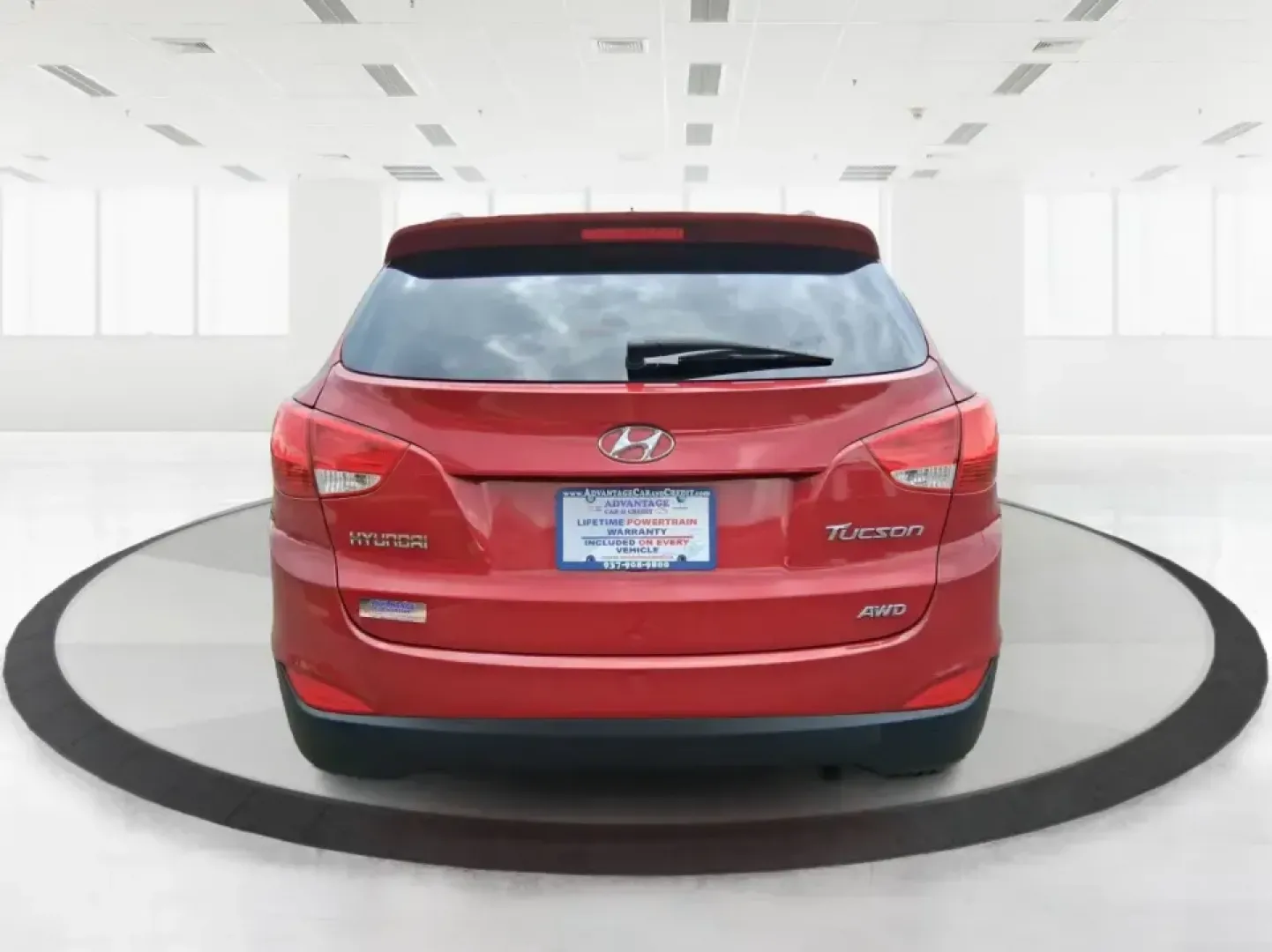 2013 Hyundai Tucson GLS (KM8JUCAC7DU) with an Theta II 2.4L I-4 DOHC engine, 6-Speed Automatic transmission, located at 8750 N County Rd 25A, Piqua, OH, 45356, (937) 908-9800, 40.164391, -84.232513 - Need a dependable SUV that can handle Ohio weather, school drop-offs, and weekend getaways without stretching your budget? This 2013 Hyundai Tucson GLS in eye-catching Garnet Red is built for real life-comfortable for daily commuting, confident on slick winter roads, and practical for everything fro - Photo#3