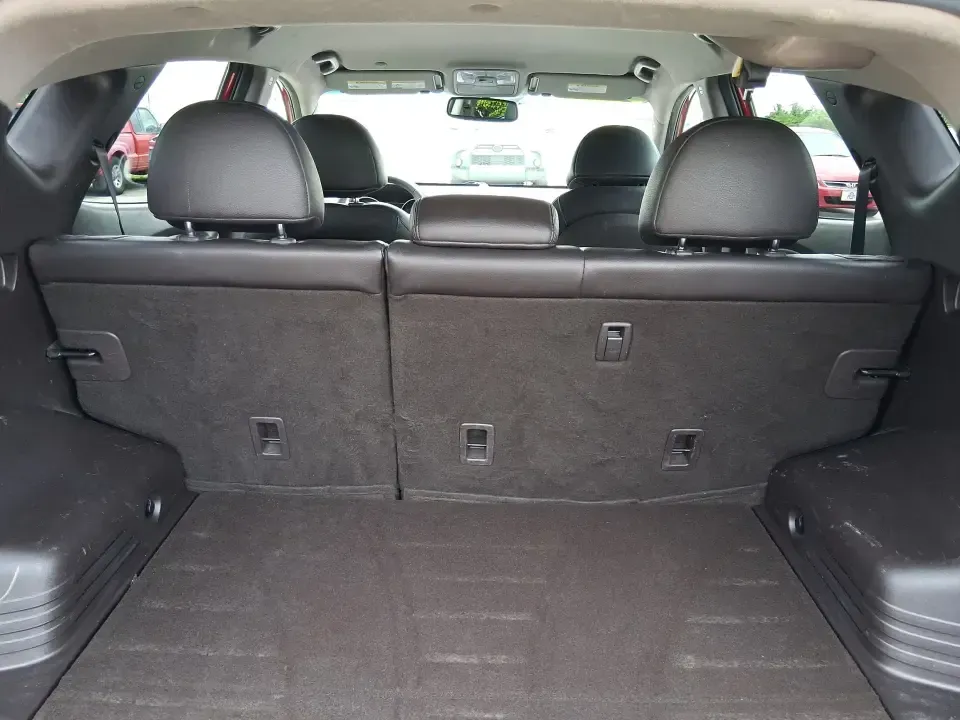 2013 Hyundai Tucson GLS (KM8JUCAC7DU) with an Theta II 2.4L I-4 DOHC engine, 6-Speed Automatic transmission, located at 8750 N County Rd 25A, Piqua, OH, 45356, (937) 908-9800, 40.164391, -84.232513 - Need a dependable SUV that can handle Ohio weather, school drop-offs, and weekend getaways without stretching your budget? This 2013 Hyundai Tucson GLS in eye-catching Garnet Red is built for real life-comfortable for daily commuting, confident on slick winter roads, and practical for everything fro - Photo#12