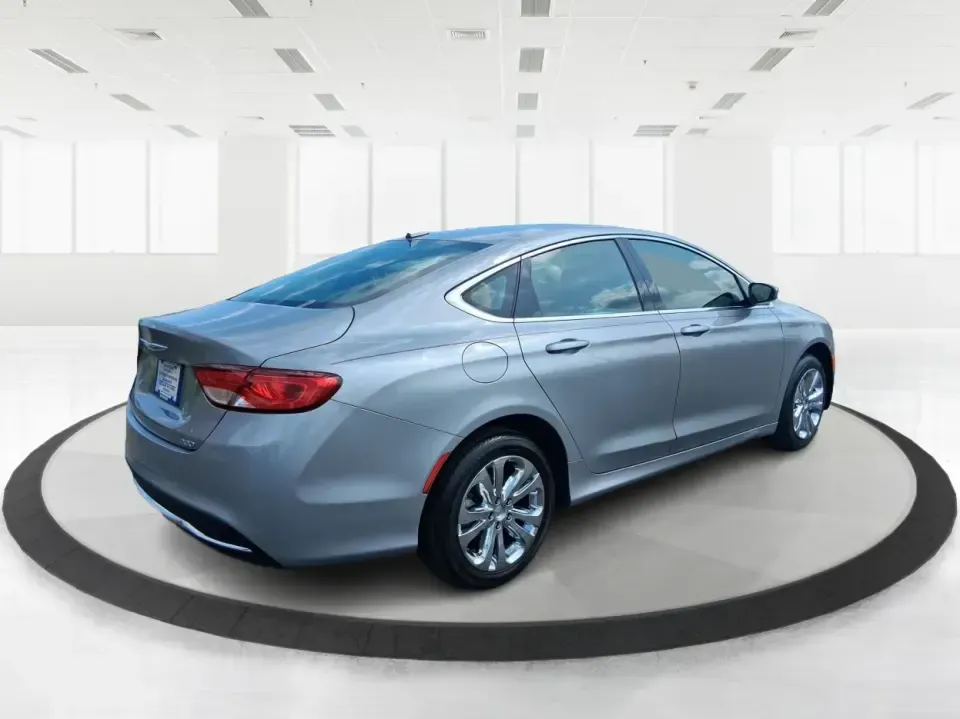 2015 Chrysler 200 Limited (1C3CCCAB5FN) with an 2.4L L4 DOHC 16V engine, 9-Speed Automatic transmission, located at 1099 N County Rd 25A , Troy, OH, 45373, (937) 908-9800, 40.057079, -84.212883 - Need a comfortable, efficient sedan for the daily commute from Troy to Dayton, quick errands along N County Rd 25A, or a weekend road trip down I-75? This 2015 Chrysler 200 Limited in Billet Silver Metallic Clearcoat fits real-life driving with a refined cabin, modern tech, and practical space for f- Photo#2