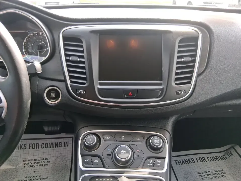 2015 Chrysler 200 Limited (1C3CCCAB5FN) with an 2.4L L4 DOHC 16V engine, 9-Speed Automatic transmission, located at 1099 N County Rd 25A , Troy, OH, 45373, (937) 908-9800, 40.057079, -84.212883 - Need a comfortable, efficient sedan for the daily commute from Troy to Dayton, quick errands along N County Rd 25A, or a weekend road trip down I-75? This 2015 Chrysler 200 Limited in Billet Silver Metallic Clearcoat fits real-life driving with a refined cabin, modern tech, and practical space for f- Photo#13
