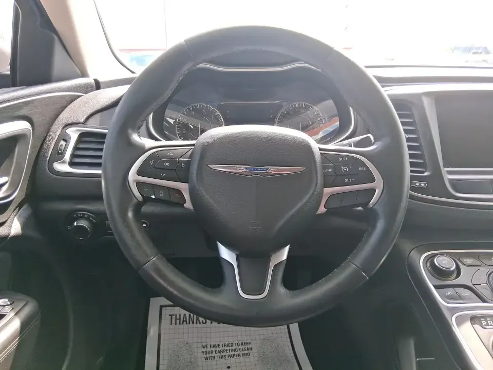 2015 Chrysler 200 Limited (1C3CCCAB5FN) with an 2.4L L4 DOHC 16V engine, 9-Speed Automatic transmission, located at 1099 N County Rd 25A , Troy, OH, 45373, (937) 908-9800, 40.057079, -84.212883 - Need a comfortable, efficient sedan for the daily commute from Troy to Dayton, quick errands along N County Rd 25A, or a weekend road trip down I-75? This 2015 Chrysler 200 Limited in Billet Silver Metallic Clearcoat fits real-life driving with a refined cabin, modern tech, and practical space for f- Photo#16