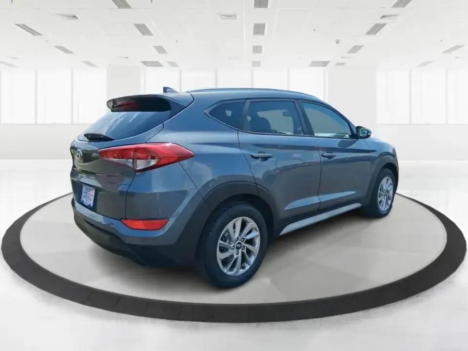 2018 Hyundai Tucson SEL Plus (KM8J33A4XJU) with an Nu 2L I-4 gasoline direct injection engine, 6A transmission, located at 1230 East Main St, Xenia, OH, 45385, (937) 908-9800, 39.688026, -83.910172 - Need a do-it-all SUV that fits real life in Greene County-school runs, long commutes to Dayton, and weekend getaways to John Bryan State Park-without sacrificing comfort or confidence? This 2018 Hyundai Tucson SEL Plus in Coliseum Gray is built for drivers who want practical space, modern tech, and - Photo#2