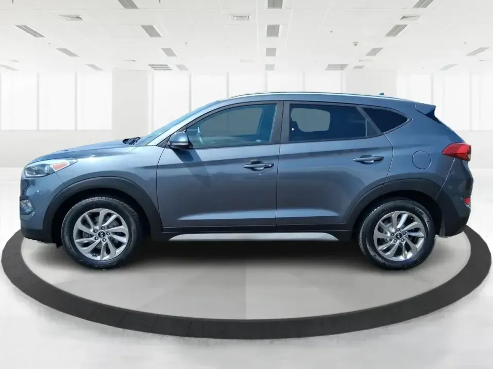 2018 Hyundai Tucson SEL Plus (KM8J33A4XJU) with an Nu 2L I-4 gasoline direct injection engine, 6A transmission, located at 1230 East Main St, Xenia, OH, 45385, (937) 908-9800, 39.688026, -83.910172 - Need a do-it-all SUV that fits real life in Greene County-school runs, long commutes to Dayton, and weekend getaways to John Bryan State Park-without sacrificing comfort or confidence? This 2018 Hyundai Tucson SEL Plus in Coliseum Gray is built for drivers who want practical space, modern tech, and - Photo#5