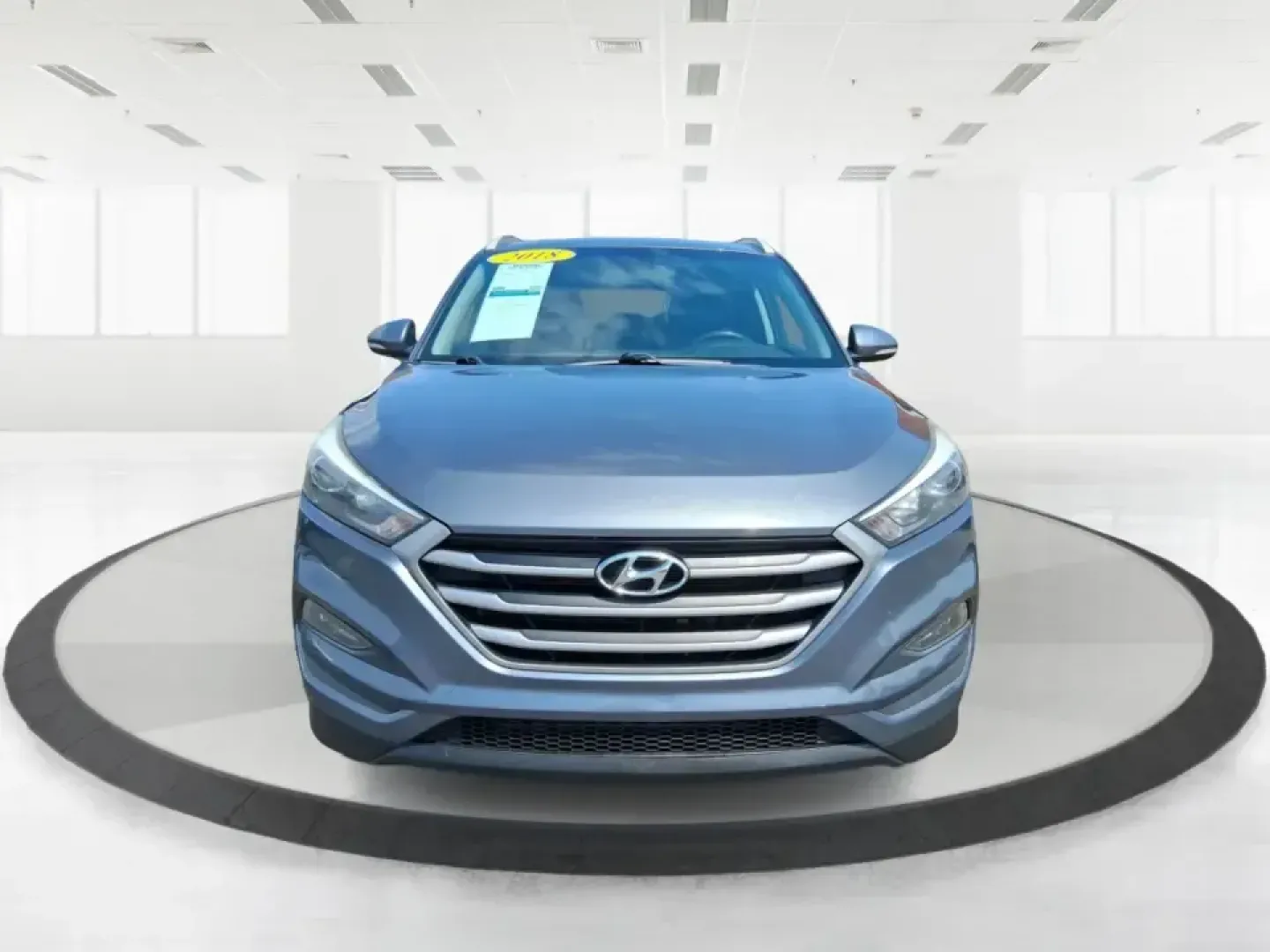 2018 Hyundai Tucson SEL Plus (KM8J33A4XJU) with an Nu 2L I-4 gasoline direct injection engine, 6A transmission, located at 8750 N County Rd 25A, Piqua, OH, 45356, (937) 908-9800, 40.164391, -84.232513 - Need a do-it-all SUV that fits real life in Greene County-school runs, long commutes to Dayton, and weekend getaways to John Bryan State Park-without sacrificing comfort or confidence? This 2018 Hyundai Tucson SEL Plus in Coliseum Gray is built for drivers who want practical space, modern tech, and - Photo#7