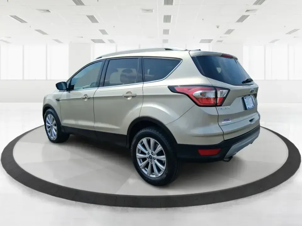 2017 Ford Escape Titanium (1FMCU9JD2HU) with an 1.5L L4 DOHC 16V engine, 6A transmission, located at 1230 East Main St, Xenia, OH, 45385, (937) 908-9800, 39.688026, -83.910172 - Whether you're a busy commuter running up and down US-35, a growing family juggling school drop-offs, or a weekend explorer heading out toward John Bryan State Park, this 2017 Ford Escape Titanium is the kind of compact SUV that fits real life in Xenia. With confident AWD capability, upscale comfort - Photo#4