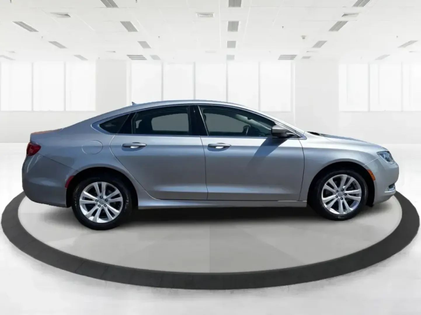 2016 Chrysler 200 Limited Platinum (1C3CCCABXGN) with an 2.4L L4 DOHC 16V engine, 9A transmission, located at 1230 East Main St, Xenia, OH, 45385, (937) 908-9800, 39.688026, -83.910172 - Picture your next weekday commute down I675 or a smooth evening drive past Wright State University-quiet cabin, premium touches, and the kind of comfort that makes errands, school drop-offs, and date nights feel effortless. This 2016 Chrysler 200 Limited Platinum in Billet Silver Metallic Clearcoat - Photo#1