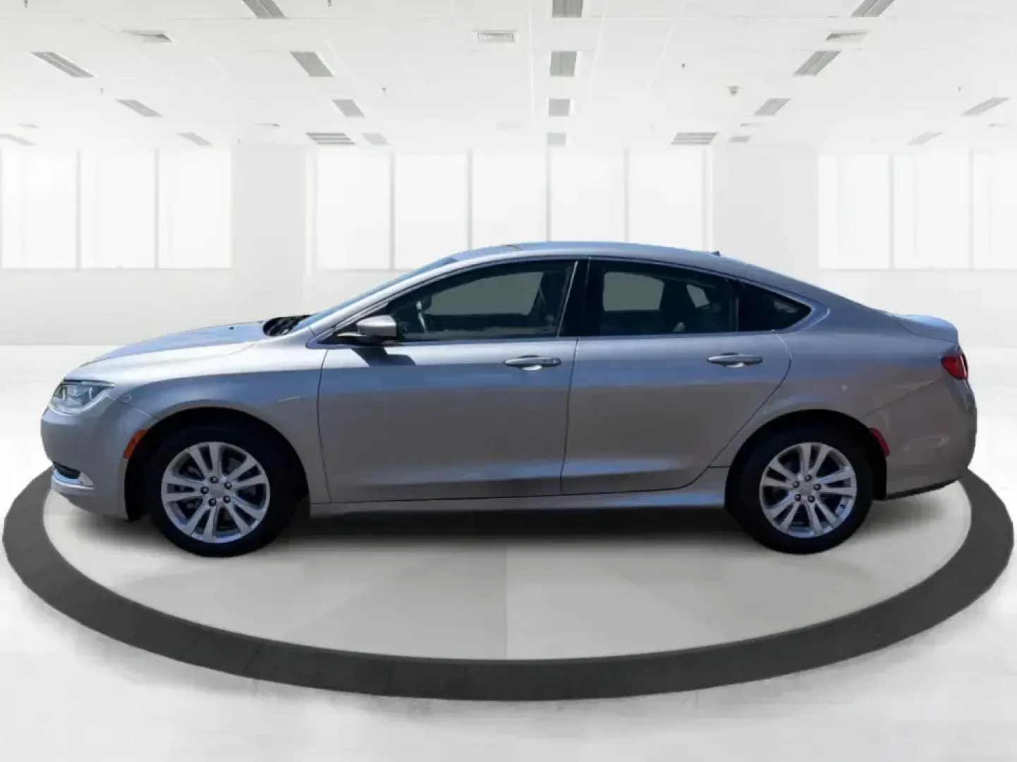 2016 Chrysler 200 Limited Platinum (1C3CCCABXGN) with an 2.4L L4 DOHC 16V engine, 9A transmission, located at 1230 East Main St, Xenia, OH, 45385, (937) 908-9800, 39.688026, -83.910172 - Picture your next weekday commute down I675 or a smooth evening drive past Wright State University-quiet cabin, premium touches, and the kind of comfort that makes errands, school drop-offs, and date nights feel effortless. This 2016 Chrysler 200 Limited Platinum in Billet Silver Metallic Clearcoat - Photo#5