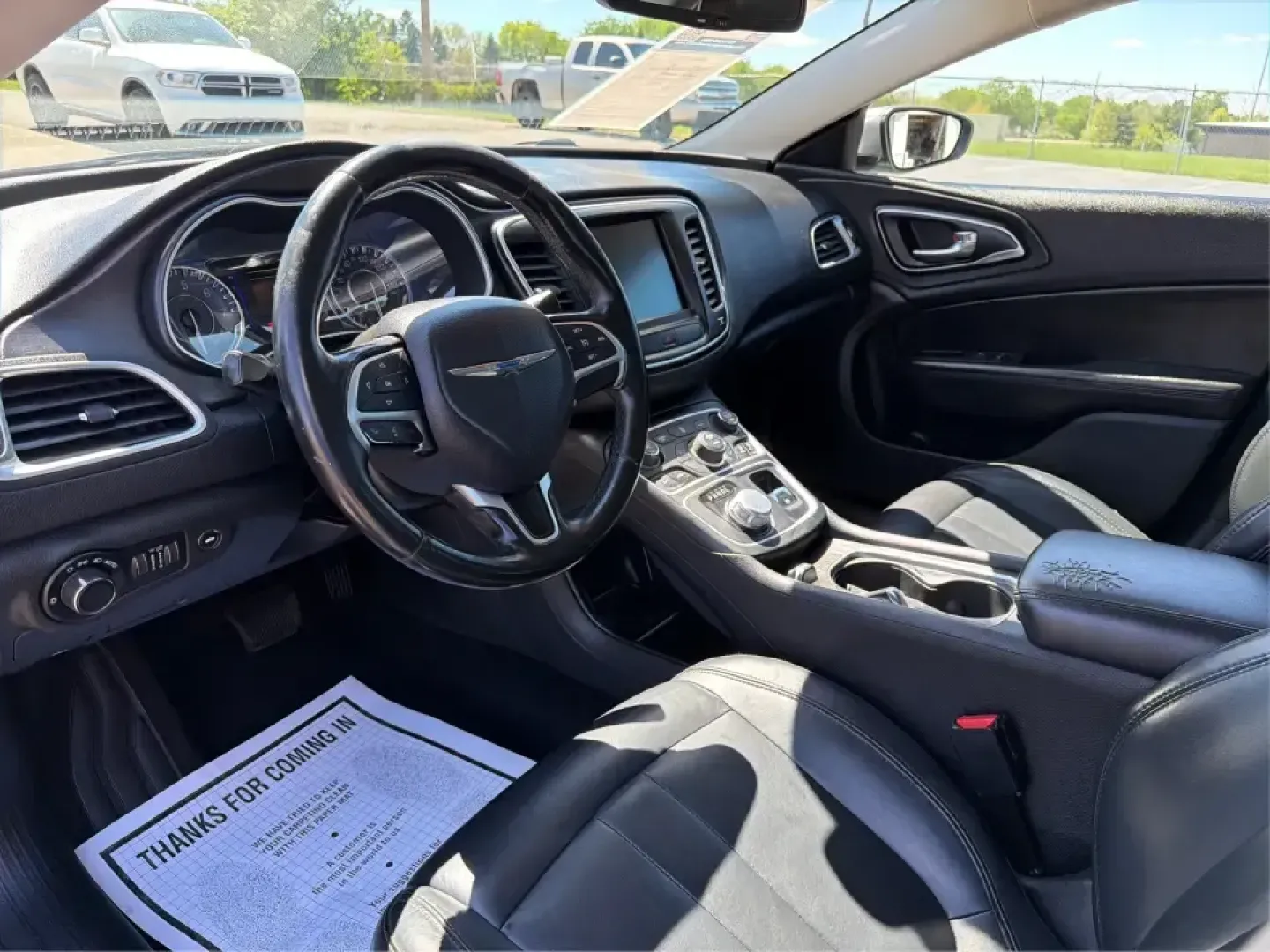 2016 Chrysler 200 Limited Platinum (1C3CCCABXGN) with an 2.4L L4 DOHC 16V engine, 9A transmission, located at 1230 East Main St, Xenia, OH, 45385, (937) 908-9800, 39.688026, -83.910172 - Picture your next weekday commute down I675 or a smooth evening drive past Wright State University-quiet cabin, premium touches, and the kind of comfort that makes errands, school drop-offs, and date nights feel effortless. This 2016 Chrysler 200 Limited Platinum in Billet Silver Metallic Clearcoat - Photo#9