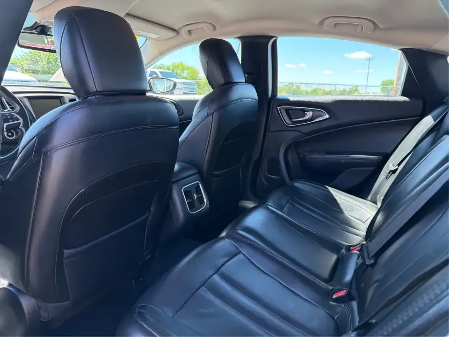 2016 Chrysler 200 Limited Platinum (1C3CCCABXGN) with an 2.4L L4 DOHC 16V engine, 9A transmission, located at 1230 East Main St, Xenia, OH, 45385, (937) 908-9800, 39.688026, -83.910172 - Picture your next weekday commute down I675 or a smooth evening drive past Wright State University-quiet cabin, premium touches, and the kind of comfort that makes errands, school drop-offs, and date nights feel effortless. This 2016 Chrysler 200 Limited Platinum in Billet Silver Metallic Clearcoat - Photo#10