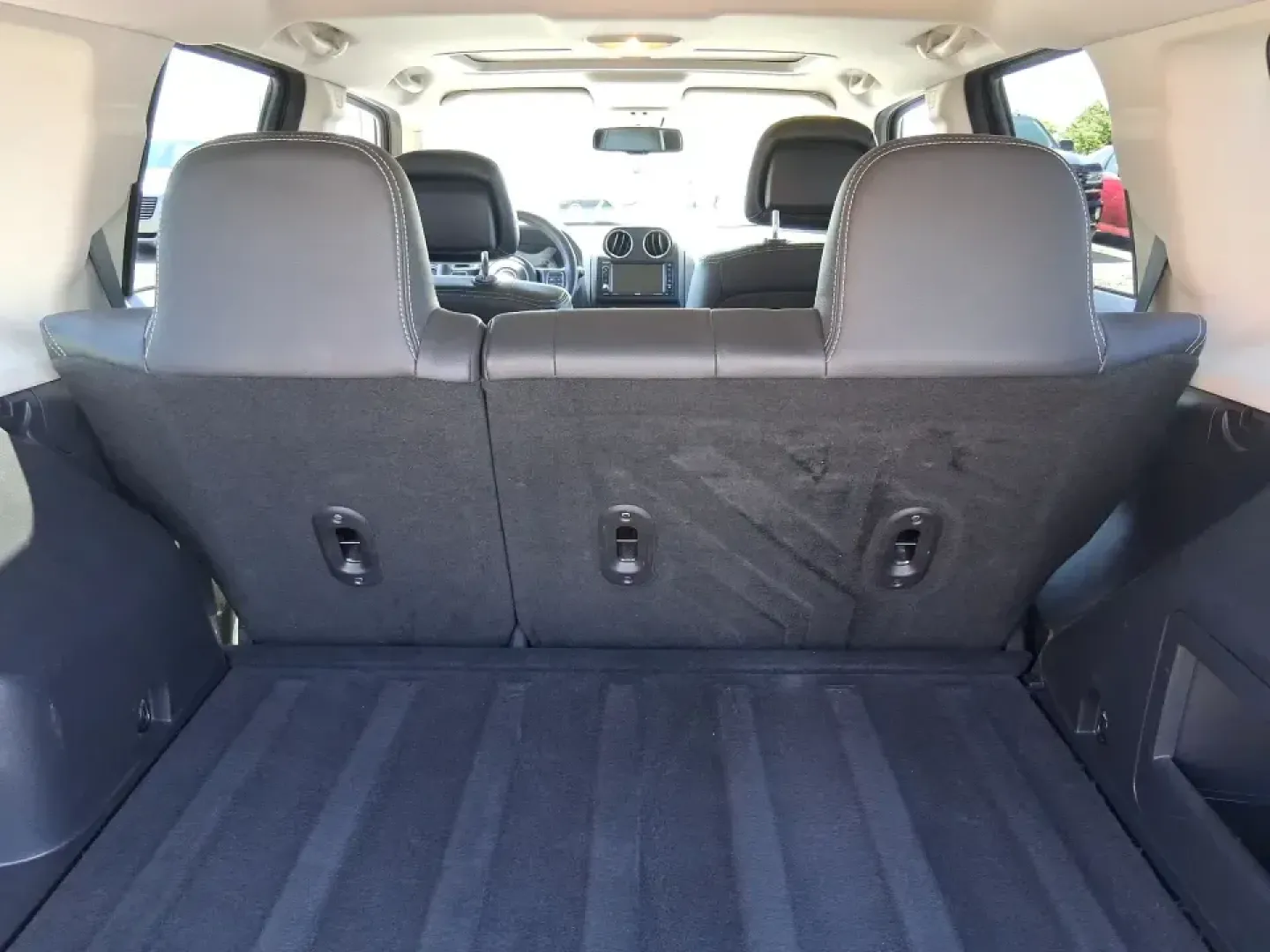 2015 Jeep Patriot Latitude 4WD (1C4NJRFB0FD) with an 2.4L L4 DOHC 16V engine, located at 401 Woodman Dr, Riverside, OH, 45431, (937) 908-9800, 39.760899, -84.123421 - Weekday commuting on I675, weekend runs to Eastwood MetroPark, or a packed-up family road trip toward Yellow Springs-this Deep Cherry Red Crystal Pearlcoat 2015 Jeep Patriot Latitude 4WD is built for the kind of life that doesn't stay parked. With SUV versatility, confident four-wheel drive, and sea- Photo#12