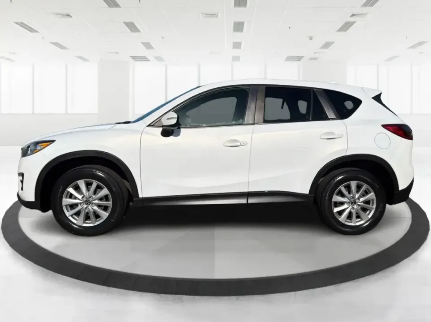 2016 Mazda CX-5 Touring (JM3KE4CYXG0) with an SKYACTIV-G 2.5L I-4 gasoline direct injection engine, 6-Speed Automatic transmission, located at 1099 N County Rd 25A , Troy, OH, 45373, (937) 908-9800, 40.057079, -84.212883 - Pack up the kids, load the groceries, or point the nose toward a weekend road trip-this 2016 Mazda CX-5 Touring is the kind of SUV that fits real life in Piqua. With confident all-weather capability and a comfortable, well-equipped cabin, it's a smart choice for commuters running up and down I75, fa - Photo#5