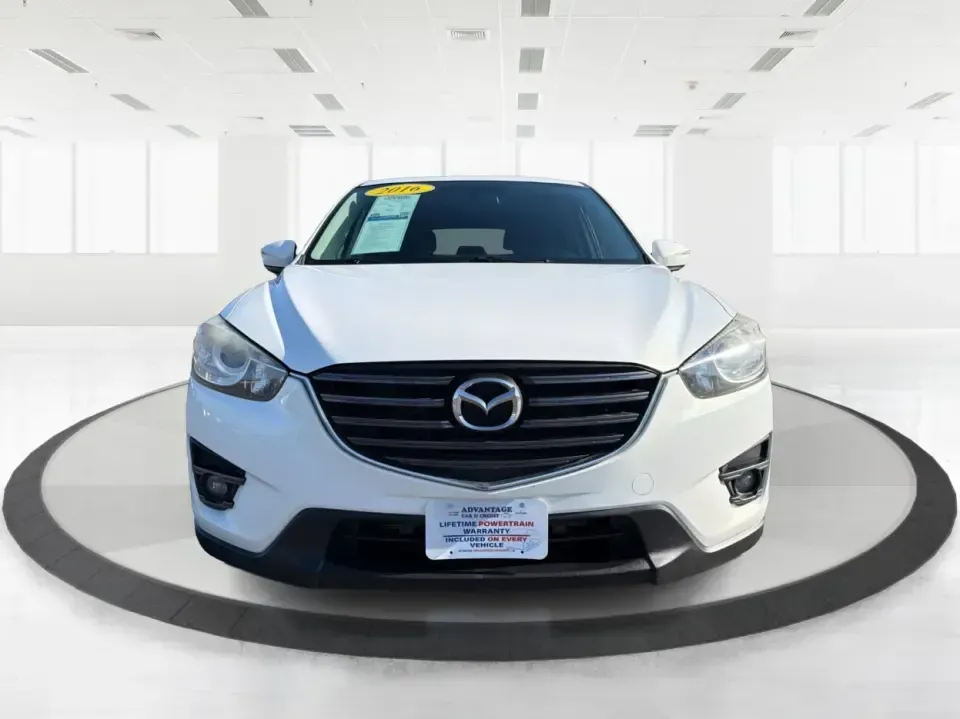 2016 Mazda CX-5 Touring (JM3KE4CYXG0) with an SKYACTIV-G 2.5L I-4 gasoline direct injection engine, 6-Speed Automatic transmission, located at 8750 N County Rd 25A, Piqua, OH, 45356, (937) 908-9800, 40.164391, -84.232513 - Pack up the kids, load the groceries, or point the nose toward a weekend road trip-this 2016 Mazda CX-5 Touring is the kind of SUV that fits real life in Piqua. With confident all-weather capability and a comfortable, well-equipped cabin, it's a smart choice for commuters running up and down I75, fa - Photo#7