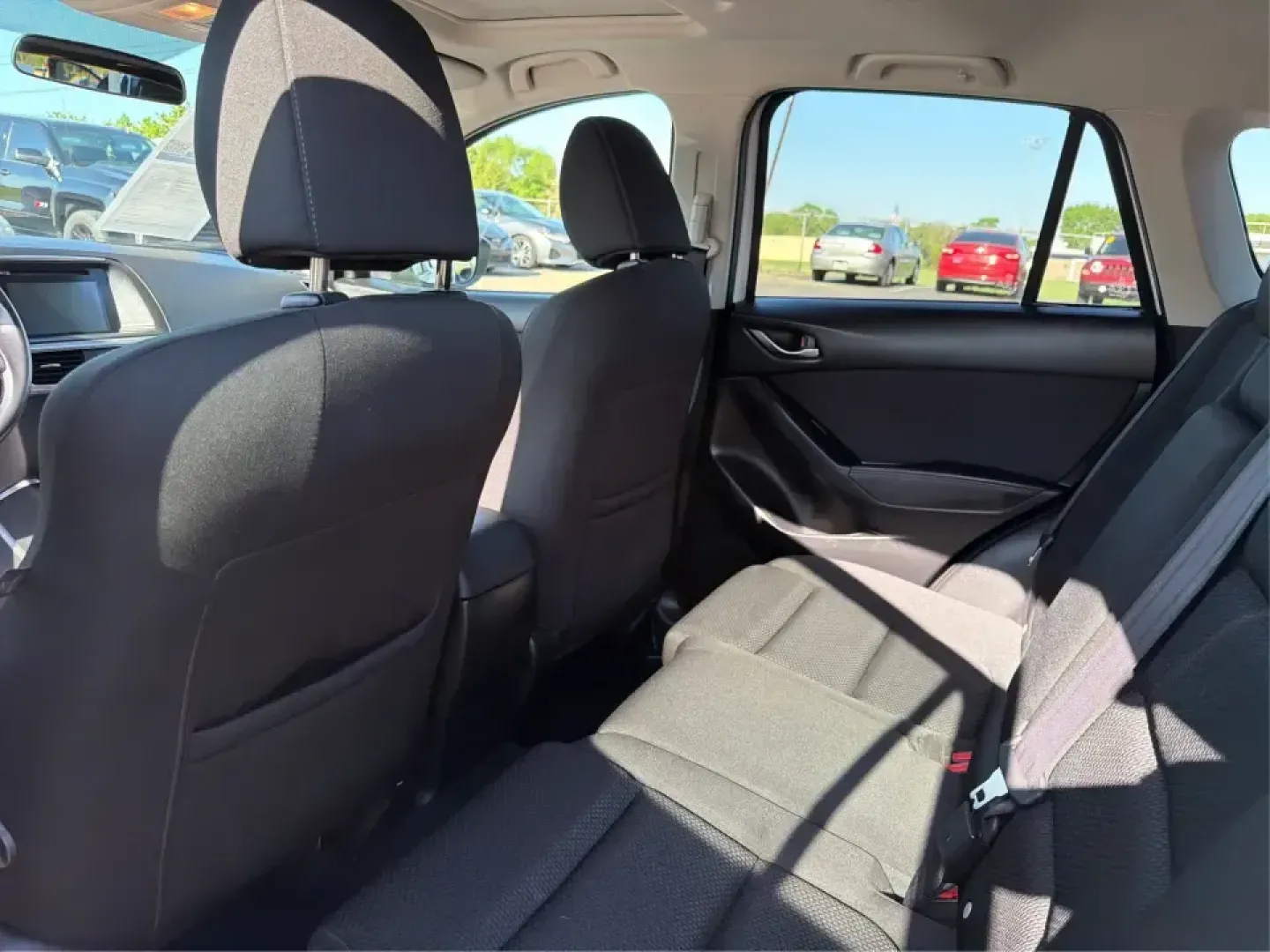 2016 Mazda CX-5 Touring (JM3KE4CYXG0) with an SKYACTIV-G 2.5L I-4 gasoline direct injection engine, 6-Speed Automatic transmission, located at 1099 N County Rd 25A , Troy, OH, 45373, (937) 908-9800, 40.057079, -84.212883 - Pack up the kids, load the groceries, or point the nose toward a weekend road trip-this 2016 Mazda CX-5 Touring is the kind of SUV that fits real life in Piqua. With confident all-weather capability and a comfortable, well-equipped cabin, it's a smart choice for commuters running up and down I75, fa - Photo#10